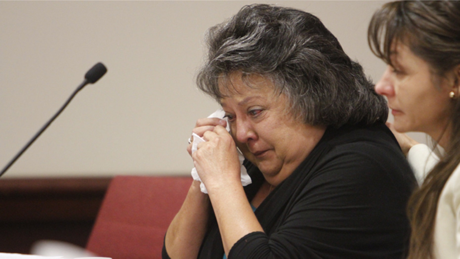 Former New Mexico Secretary of State Dianna Duran wipes away tears during her sentencing at Judge T. Glenn Ellington's district courtroom in Santa Fe, N.M., Monday, Dec. 14, 2015. Duran was sentenced to 30 days in jail for siphoning money from her election account to fuel a gambling addiction in a case that has led to calls for an overhaul of the stateâs campaign finance and ethics laws (Luis Sanchez Saturno/Santa Fe New Mexican via AP) MANDATORY CREDIT