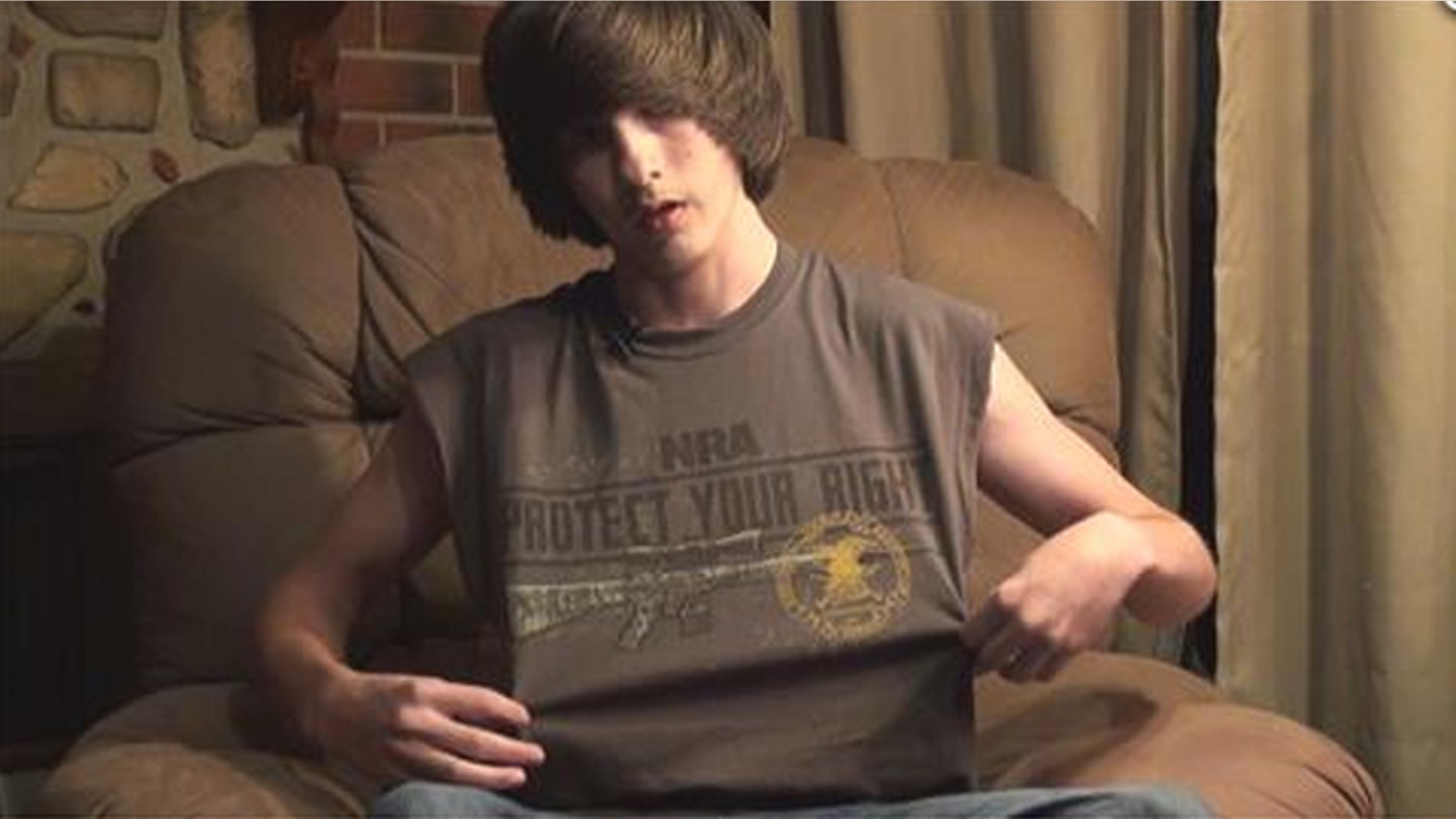 Jared Marcum, 14, returned to class wearing the same NRA T-shirt that led to his suspension and arrest after he refused a teacher's order last week to remove it.
