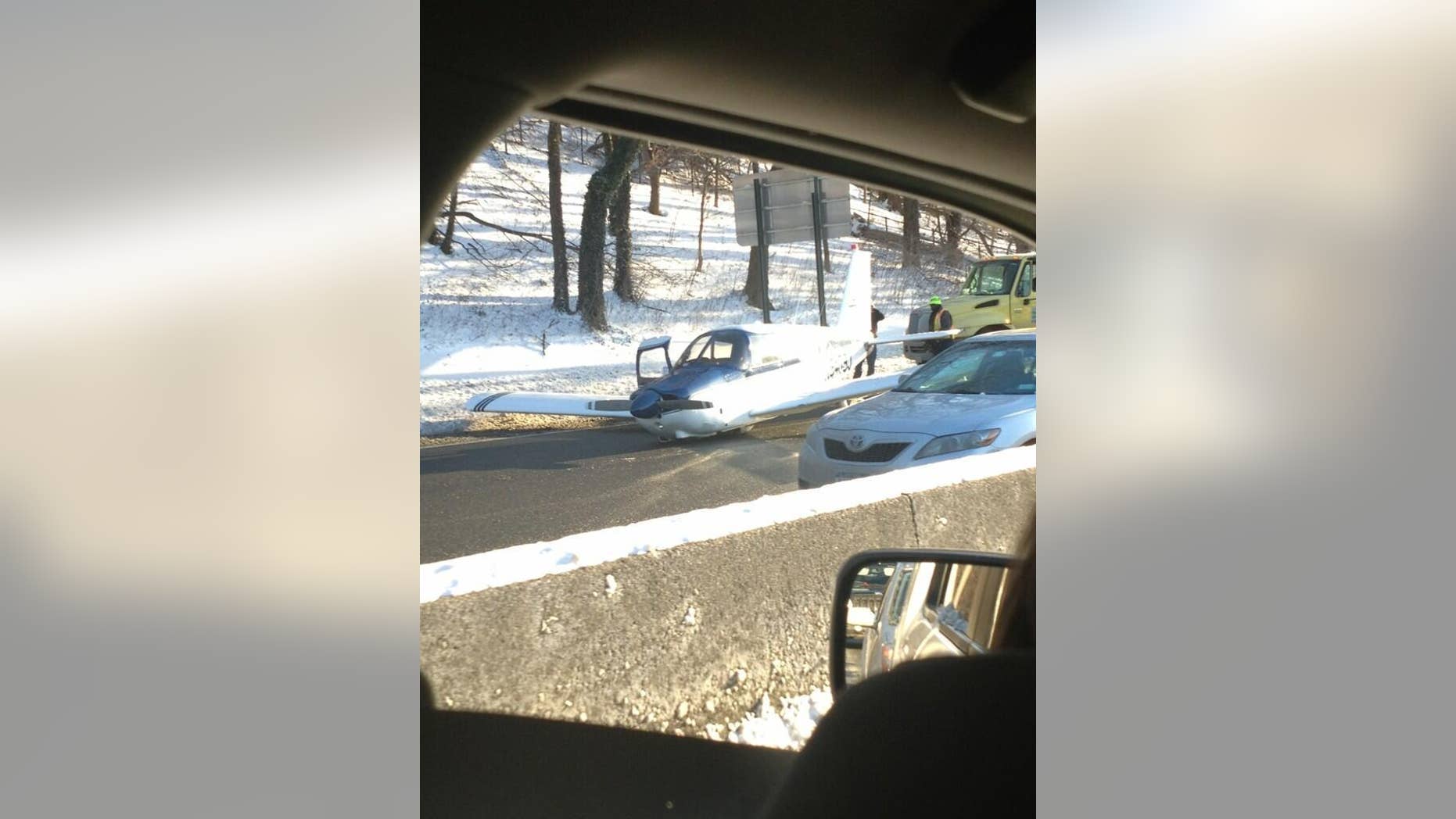 Jan. 4, 2014: This photo shows a small plane after it landed on a NYC highway.