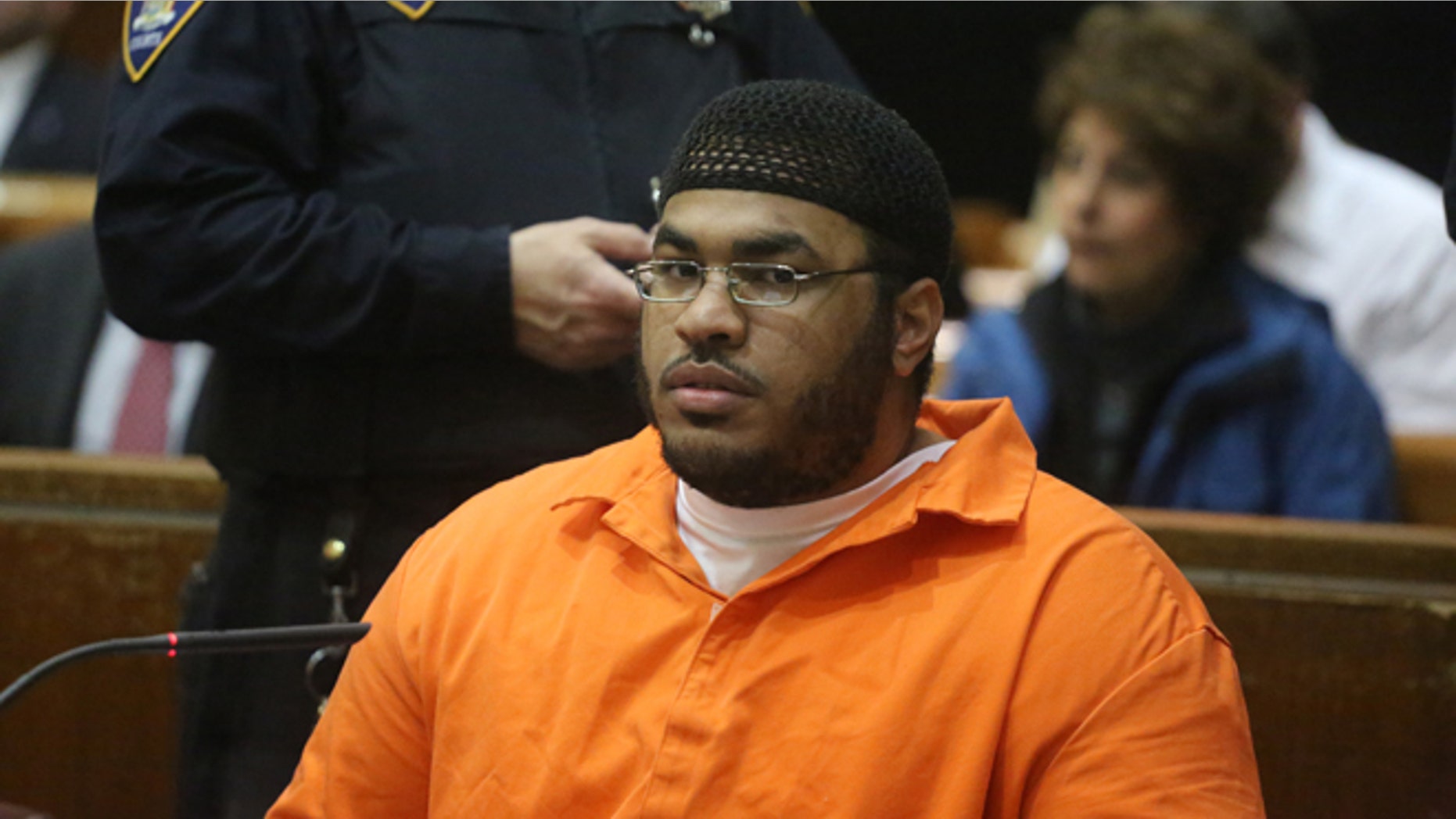 Jose Pimentel appears in a courtroom in New York, Wednesday, Feb. 19, 2014. Pimentel, accused of building homemade bombs to wage holy war in New York City, pleaded guilty Wednesday to a terrorism charge less than a week before his scheduled trial in a rare state-level terrorism case. With the plea, Pimentel, 29, was promised a sentence of 16 years in prison. He would have faced a minimum of 15 years to life if convicted of the top charge, a high-level weapons possession offense as a terrorism crime. (AP Photo/The Daily News, Jefferson Siegel, Pool)