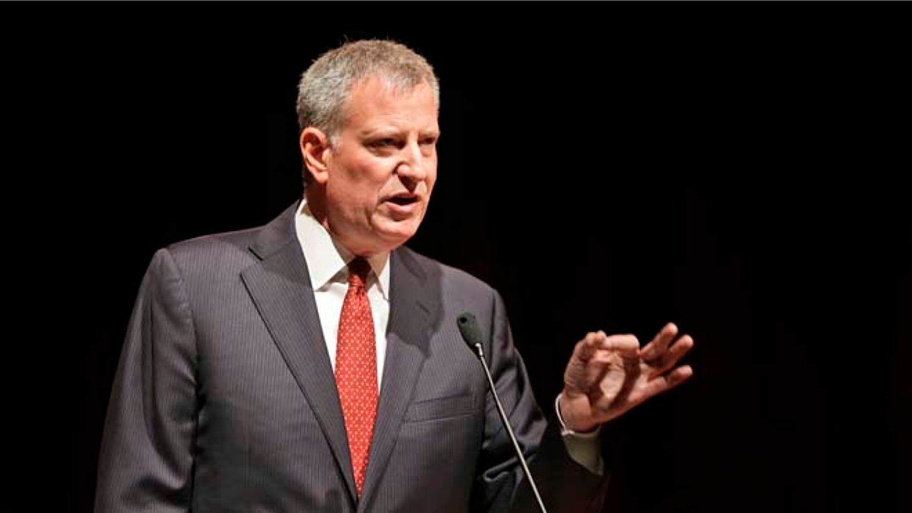 New York City Mayor Bill de Blasio speaks to the graduates of the Boys and Girls High School in the Bedford-Stuyvesant section of Brooklyn in New York, Thursday, June 25, 2015. The New York state legislative session lurched to an end Tuesday, shunting sweeping changes to the side while largely preserving the status quo, an outcome that yielded scant victories and much frustration for de Blasio. (AP Photo/Seth Wenig)