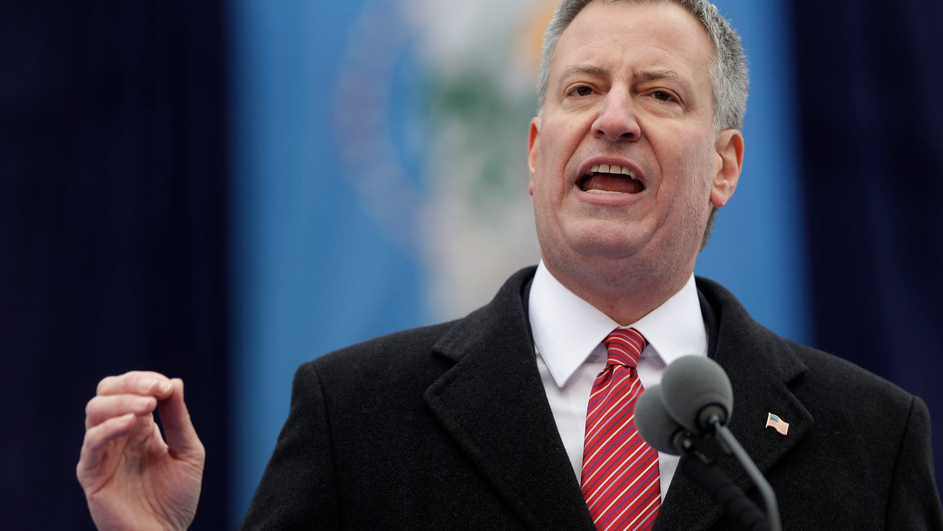 New York City Mayor Bill de Blasio speaks after being sworn in during the public inauguration ceremony at City Hall in New York, Wednesday, Jan. 1, 2014. (AP Photo/Seth Wenig)