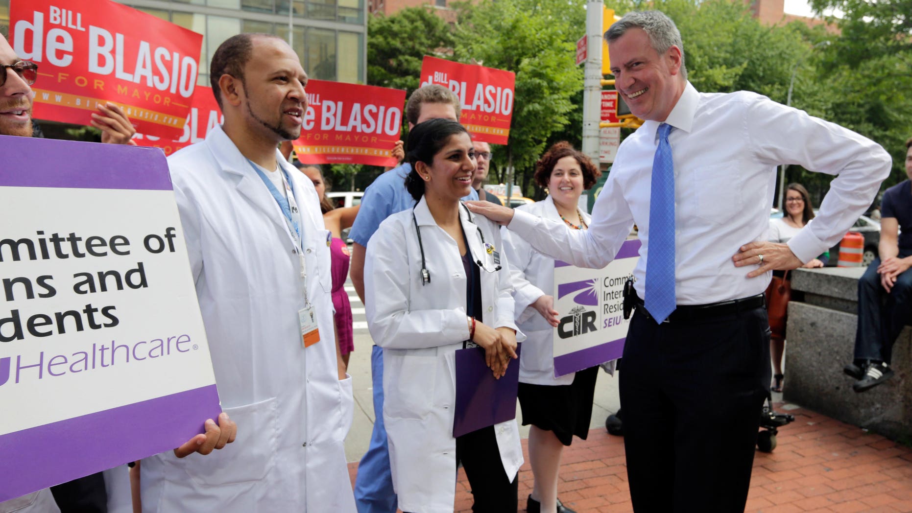 FILE - In this Aug. 14, 2013 file photo, New York City Public Advocate and Democratic mayoral hopeful Bill de Blasio accepts the endorsement of the Committee of Interns and Residents, their first ever in a mayoral campaign, in New York. The candidates high profile battle against closing hospitals has contributed to his rise into top spot in recent polls. (AP Photo/Richard Drew, File)