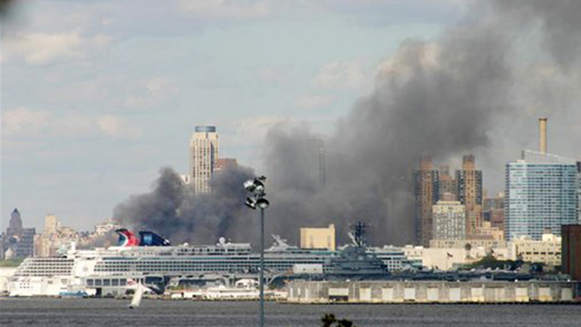 NYC Sanitation Pier, Trash-filled Trailers Catch Fire, Spew Smoke; 3 ...