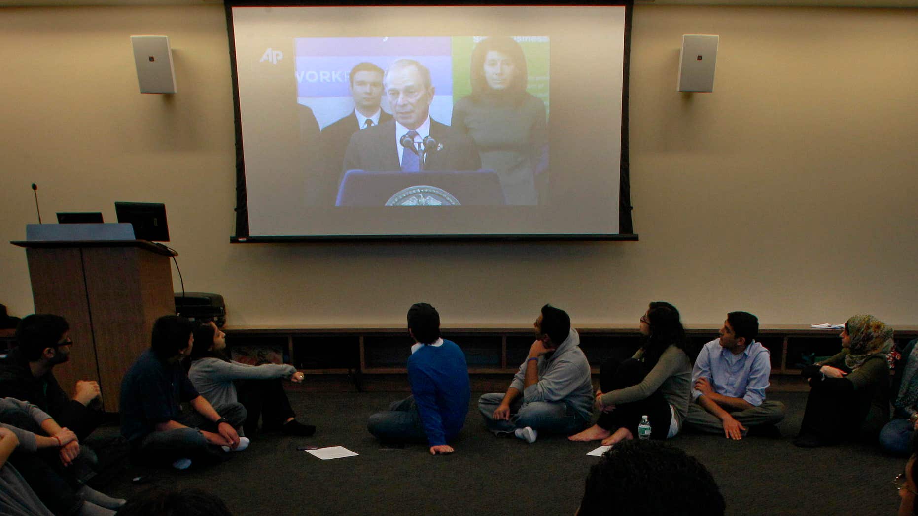 Feb. 24, 2012: Students watch statements by New York City Mayor Michael Bloomberg during a round table discussion at the Islamic Center at New York University.