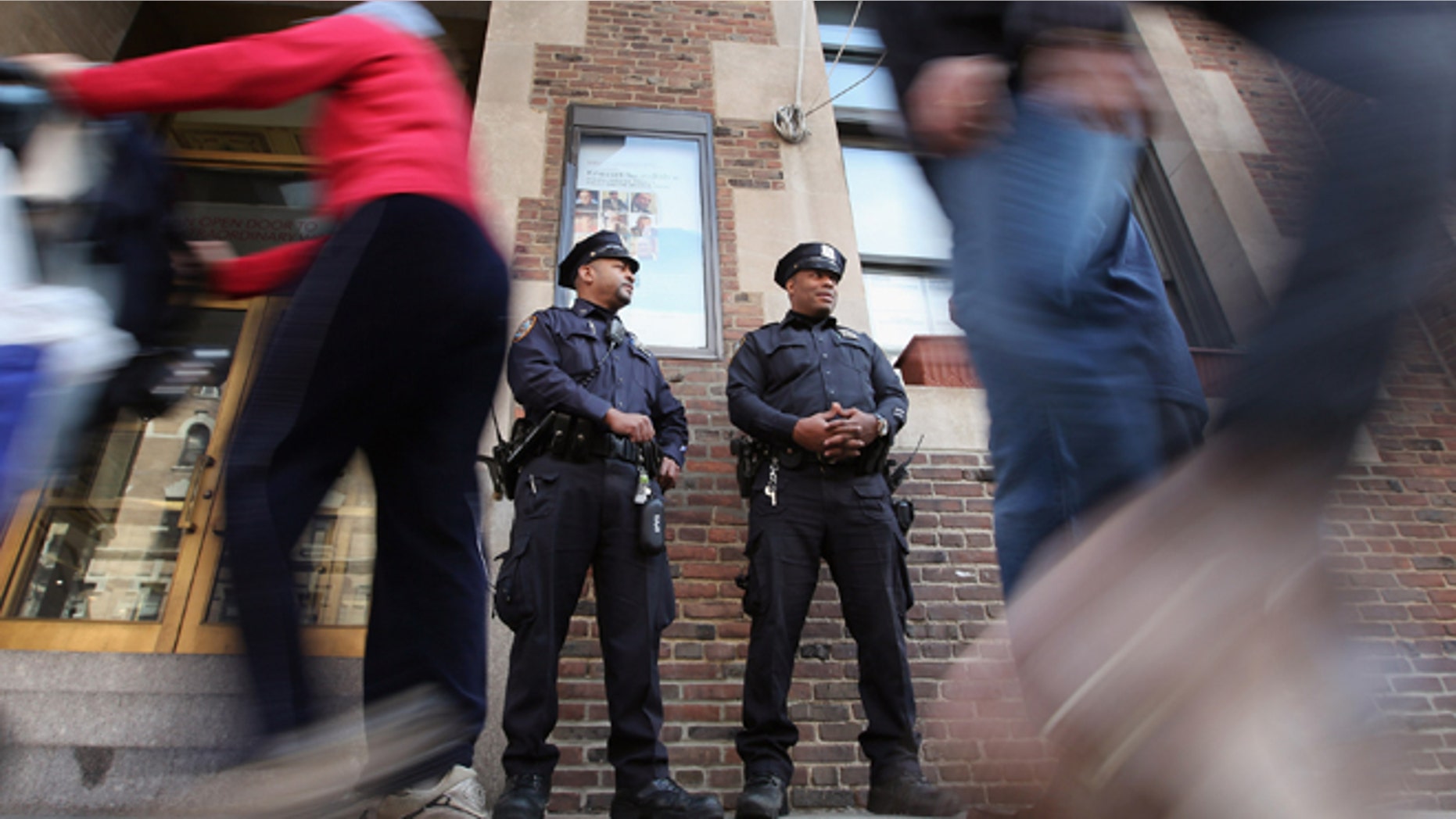 NEW YORK, NY - MARCH 20: New York Police Department officers keep watch outside the 92nd Street Y, a Jewish institution, in Manhattan on March 20, 2012 in New York City. Extra security has been added to Jewish sites around the city following the attack on a Jewish school in France that killed four people. (Photo by Mario Tama/Getty Images)