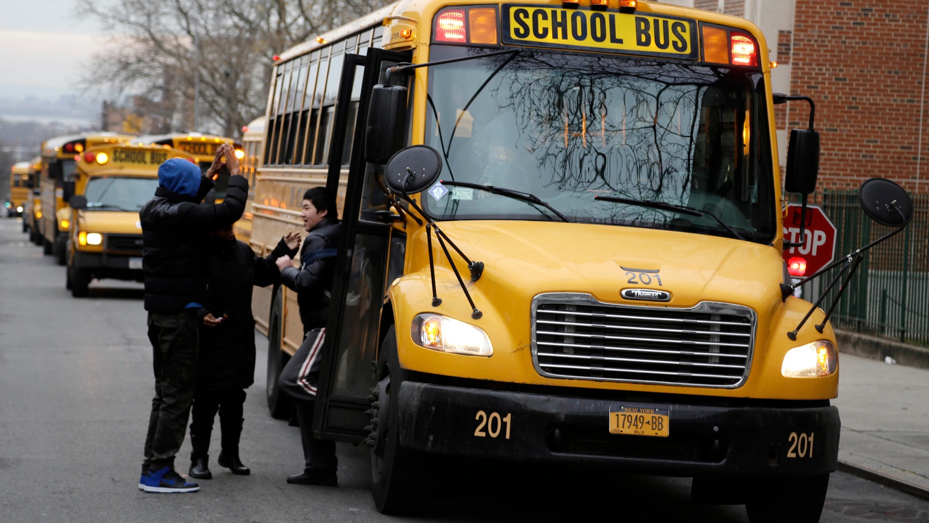 Jan. 15, 2013: School buses line up to drop off students in New York.