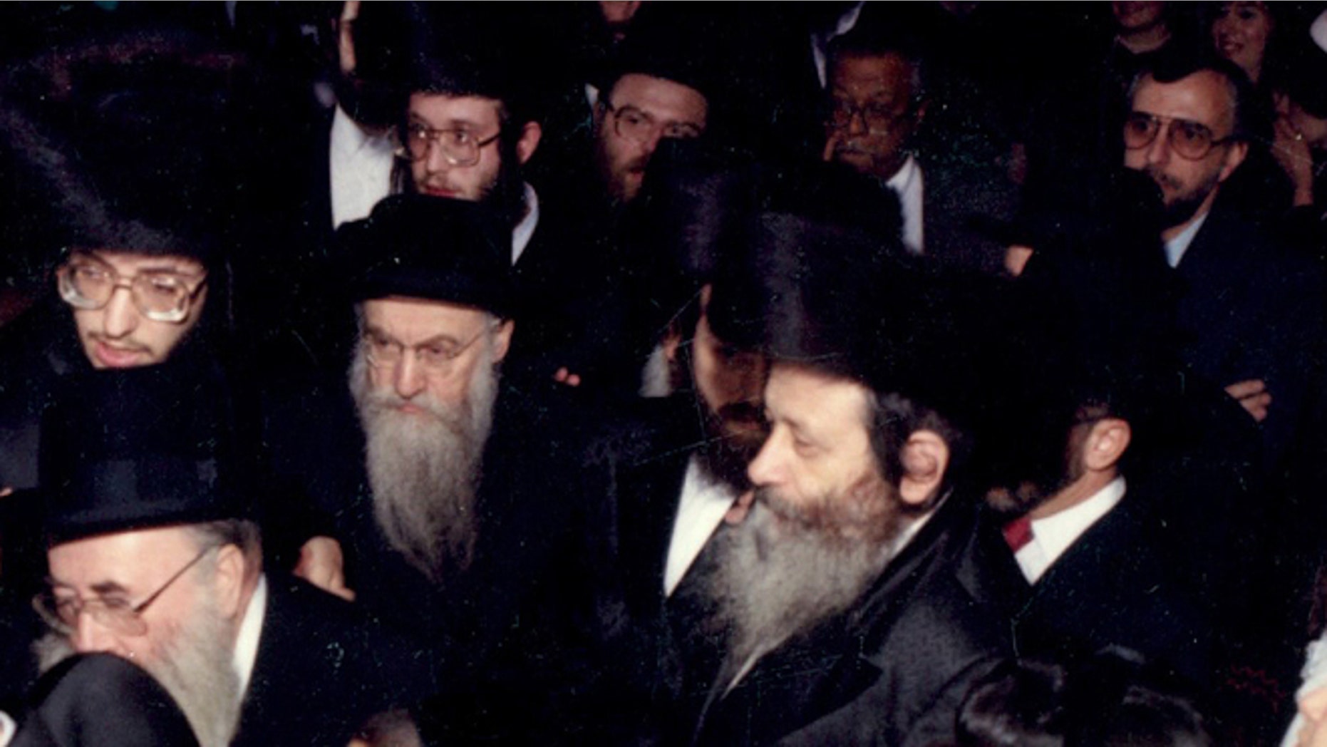 Nov. 1, 1989: In this photo provided by vosizneias.com, courtesy of Isaac Abraham, Rabbi Chaskel Werzberger, center right, attends a wedding in the Williamsburg section of the Brooklyn borough of New York.