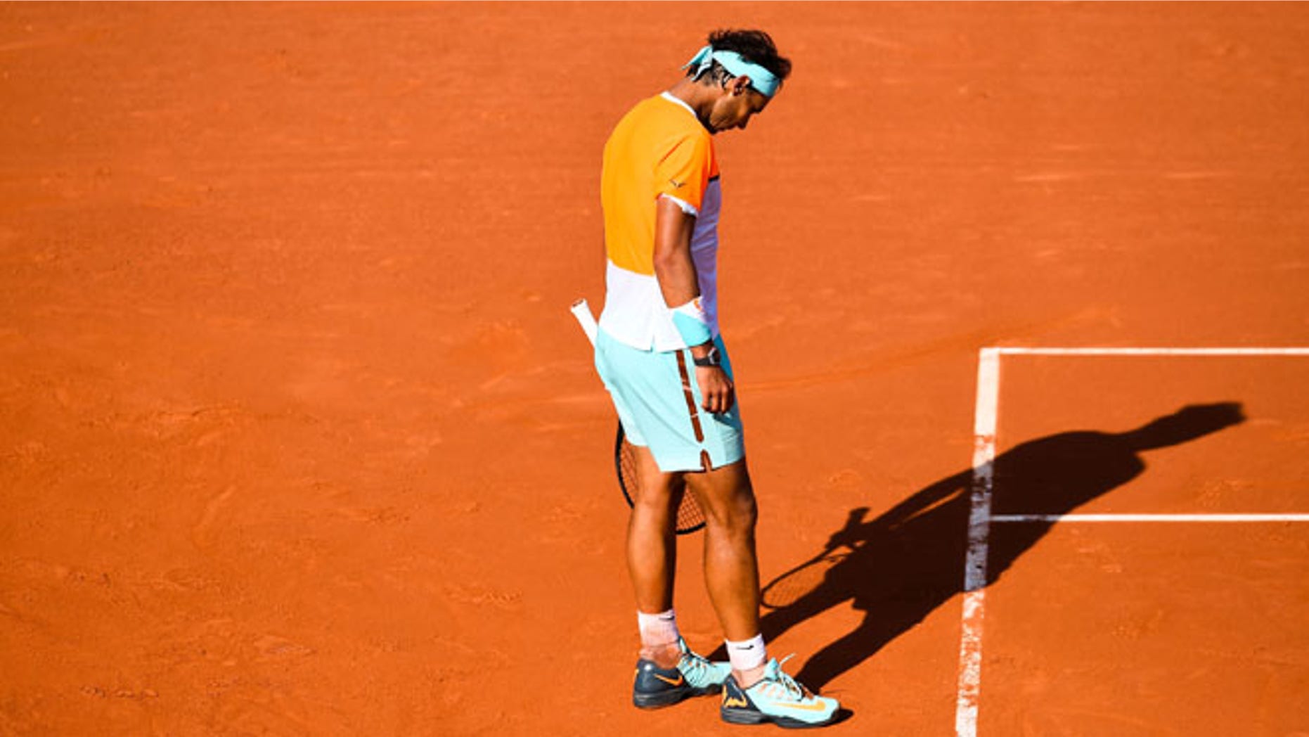 BARCELONA, SPAIN - APRIL 23: Rafael Nadal of Spain reacts dejected against Fabio Fognini of Italy during day four of the Barcelona Open Bac Sabadell at the Real Club de Tenis Barcelona on April 23, 2015 in Barcelona, Spain. Fabio Fognini won 6-4, 7-6. (Photo by David Ramos/Getty Images)