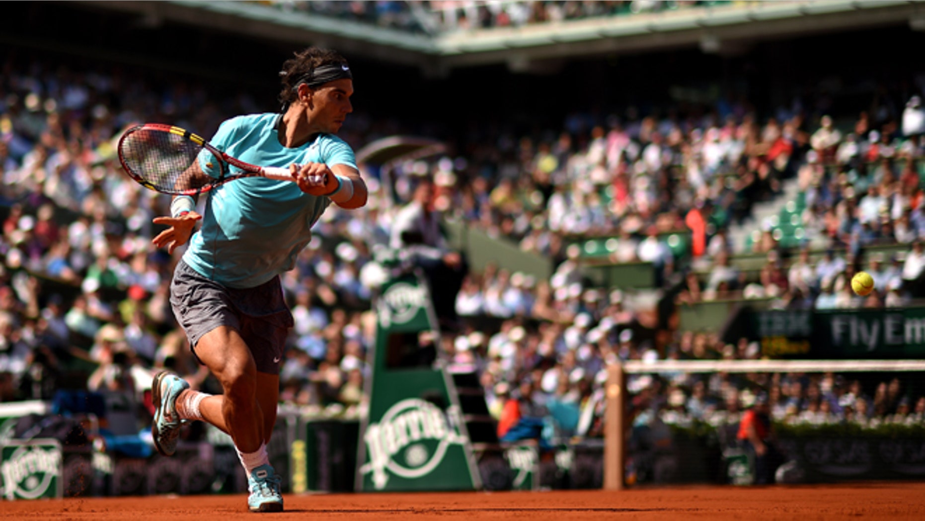 PARIS, FRANCE - MAY 31: Rafael Nadal of Spain returns a shot during his men's singles match against Leonardo Mayer of Argentina on day seven of the French Open at Roland Garros on May 31, 2014 in Paris, France. (Photo by Matthias Hangst/Getty Images)