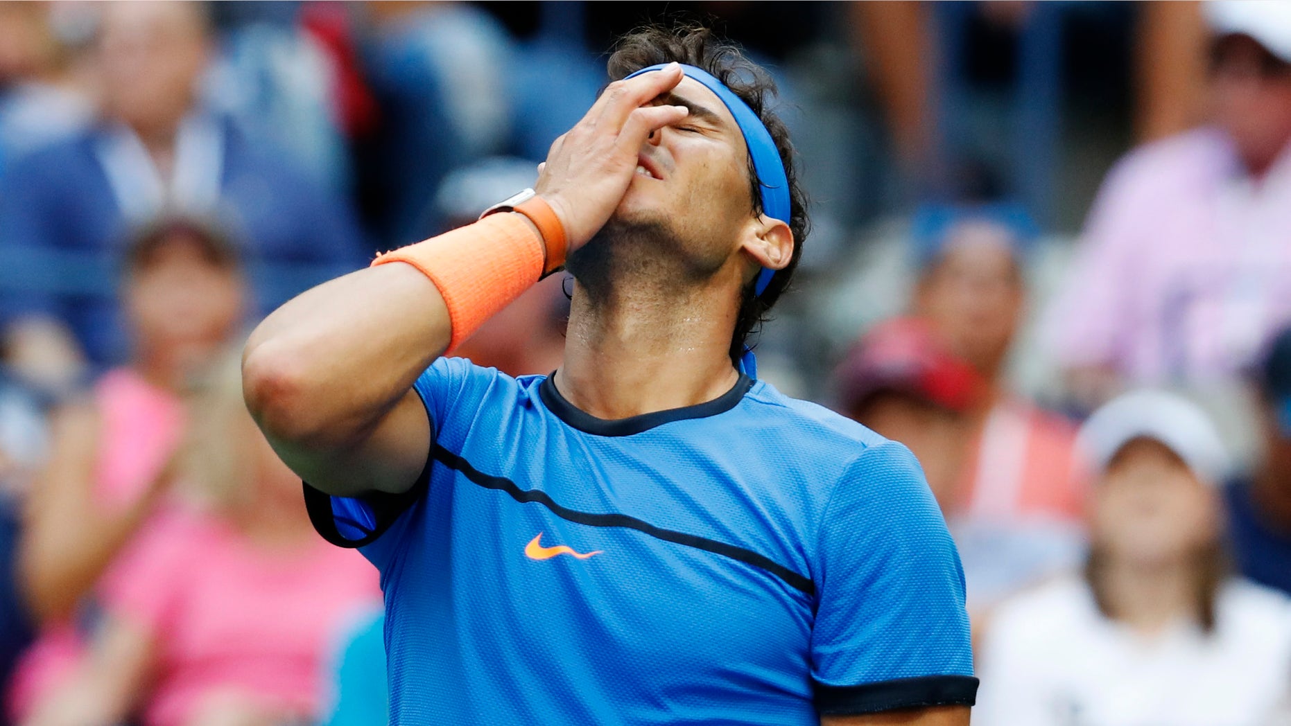 Rafael Nadal, of Spain, reacts during his match with Lucas Pouille, of France, during the fourth round of the U.S. Open tennis tournament, Sunday, Sept. 4, 2016, in New York. (AP Photo/Alex Brandon)