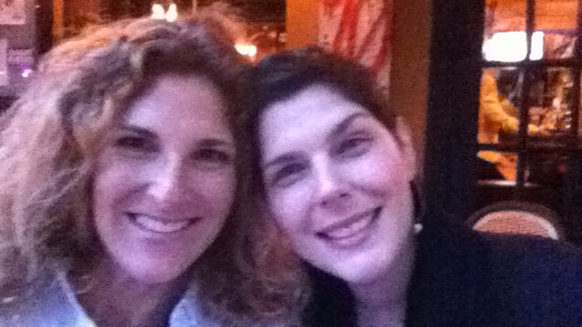 Elizabeth Joice (R) is pictured here with Dr. Nadya Swedan. Joice, a sarcoma patient, recently passed away shortly after giving birth to her first child. (Image courtesy of Nadya Swedan)