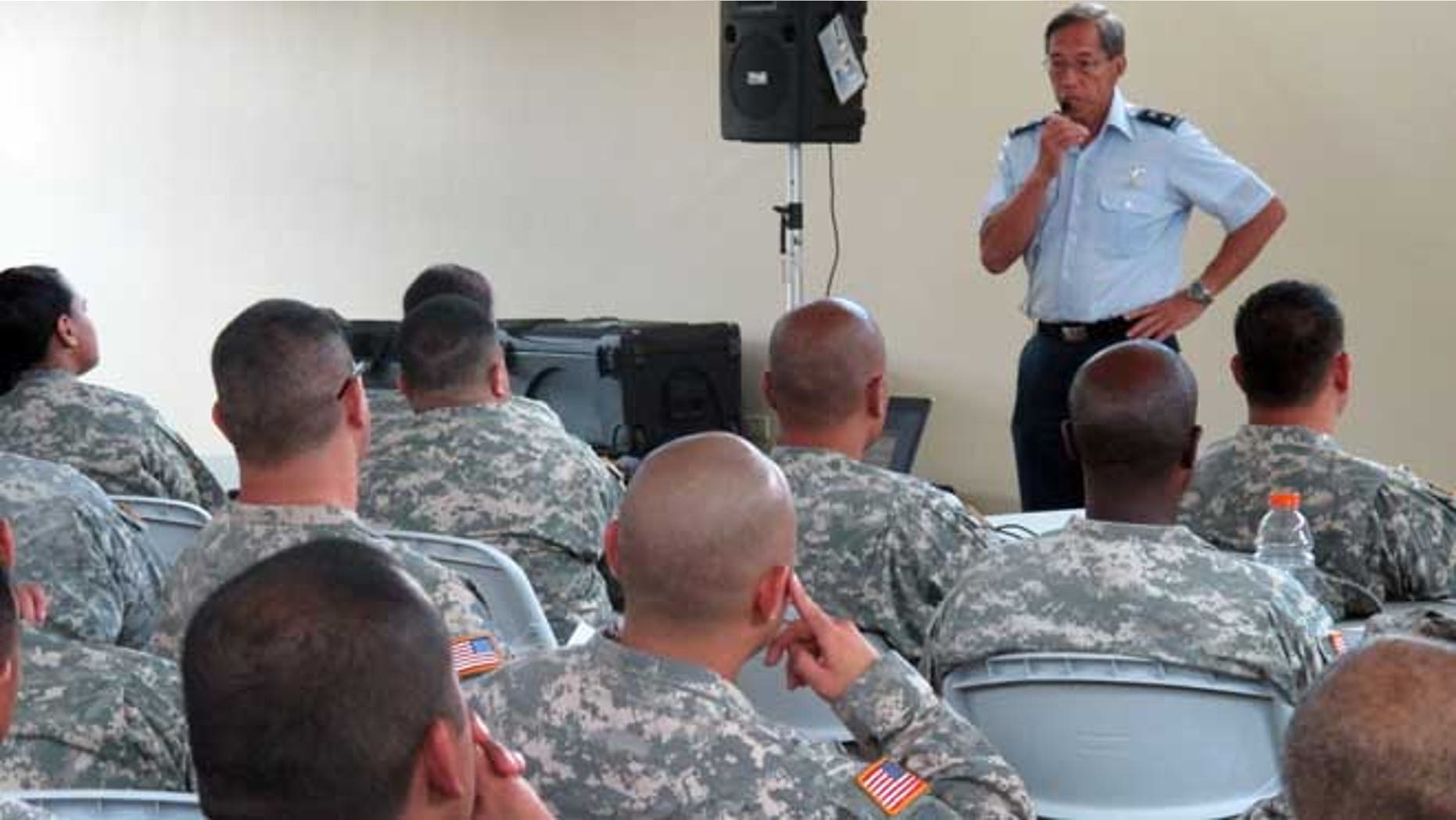 July 1, 2013: Maj. Gen. Darryll Wong, Hawaii National Guard commander, speaks to soldiers and airmen about furloughs in Kapolei, Hawaii. More than 1,100 National Guard soldiers and airmen in Hawaii and thousands in other states will be living with 20 percent less pay over the next three months as the Defense Department carries out automatic federal budget cuts.