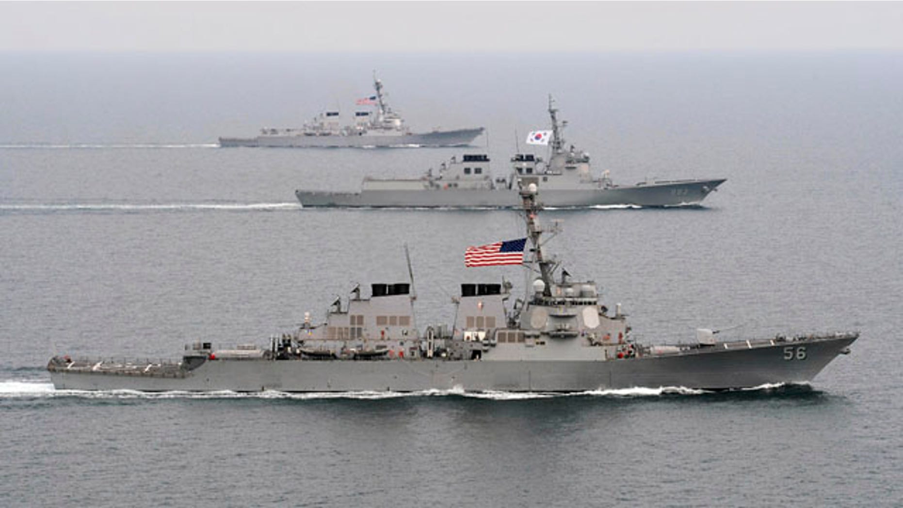 March 17, 2013: The Arleigh Burke-class guided-missile destroyer USS John S. McCain (DDG 56), foreground, the Republic of Korea Navy Aegis-class destroyer ROKS Seoae-Yu-Seong-Ryong (DDG 993), center, and the Arleigh Burke-class guided-missile destroyer USS McCampbell (DDG 85) move into formation during exercise Foal Eagle 2013 in the West Sea in South Korea.