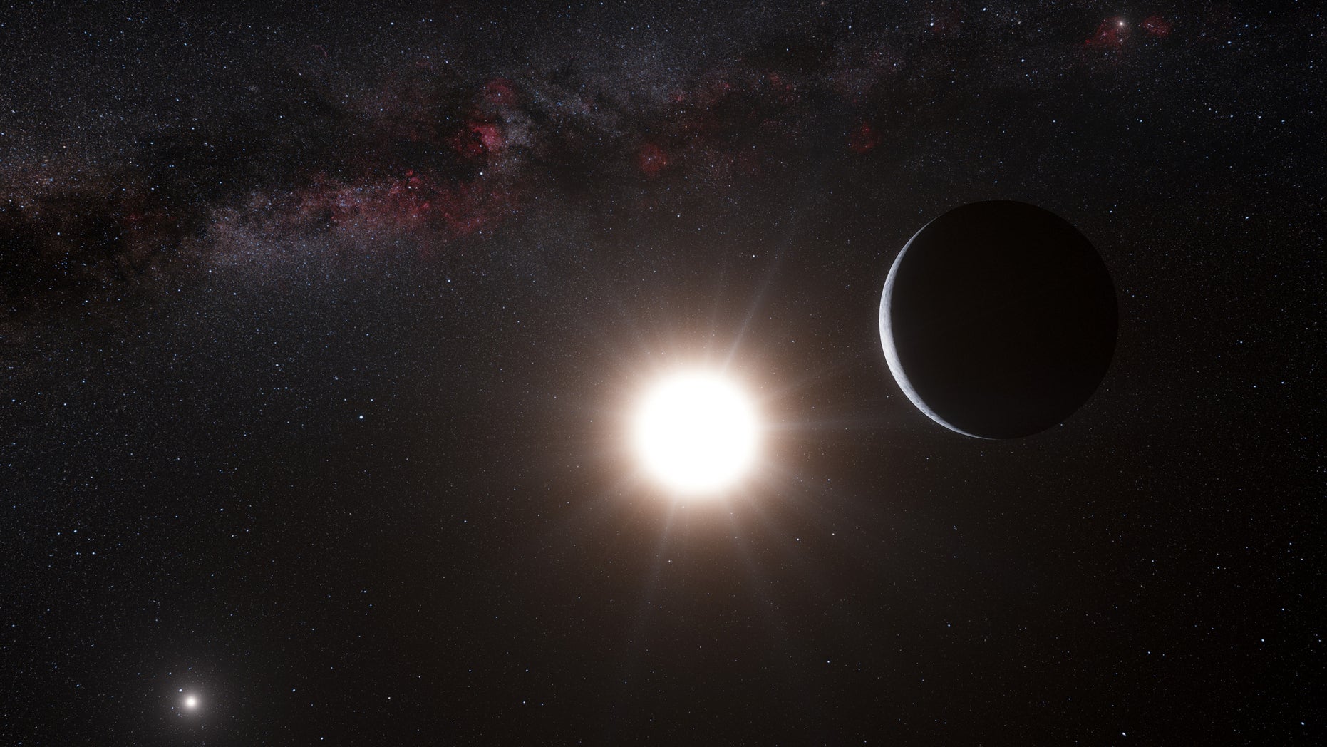 Oct. 16, 2012: This artists impression made available by the European Southern Observatory shows a planet, right, orbiting the star Alpha Centauri B, center, a member of the triple star system that is the closest to Earth. Alpha Centauri A is at left. The Earth's Sun is visible at upper right.