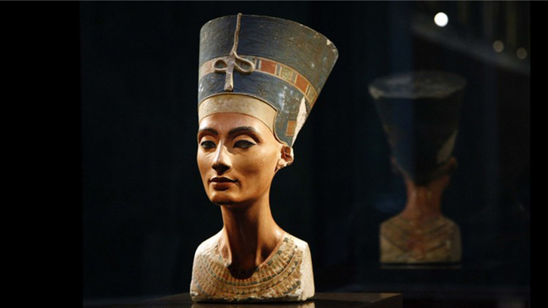 The statue of Queen Nefertiti seen during a press preview at the 'Neues Museum' (New Museum) building in Berlin October 15, 2009. As of January 24, 2011, Egypt has formally requested the return of the famous 3,400-year-old bust, which is part of a permanent Egyptian exhibition on display at the museum in Berlin.