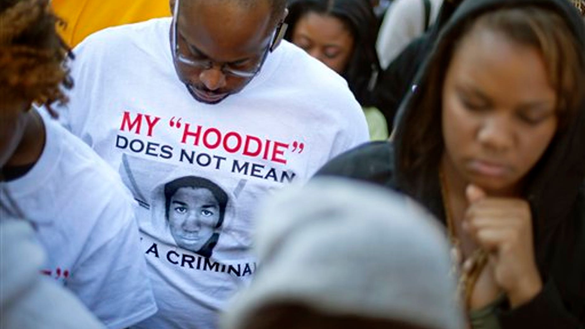 March 26: Andre Parker, of Atlanta, wears a t-shirt in memory of Trayvon Martin during a rally outside the Georgia Capitol, in Atlanta.