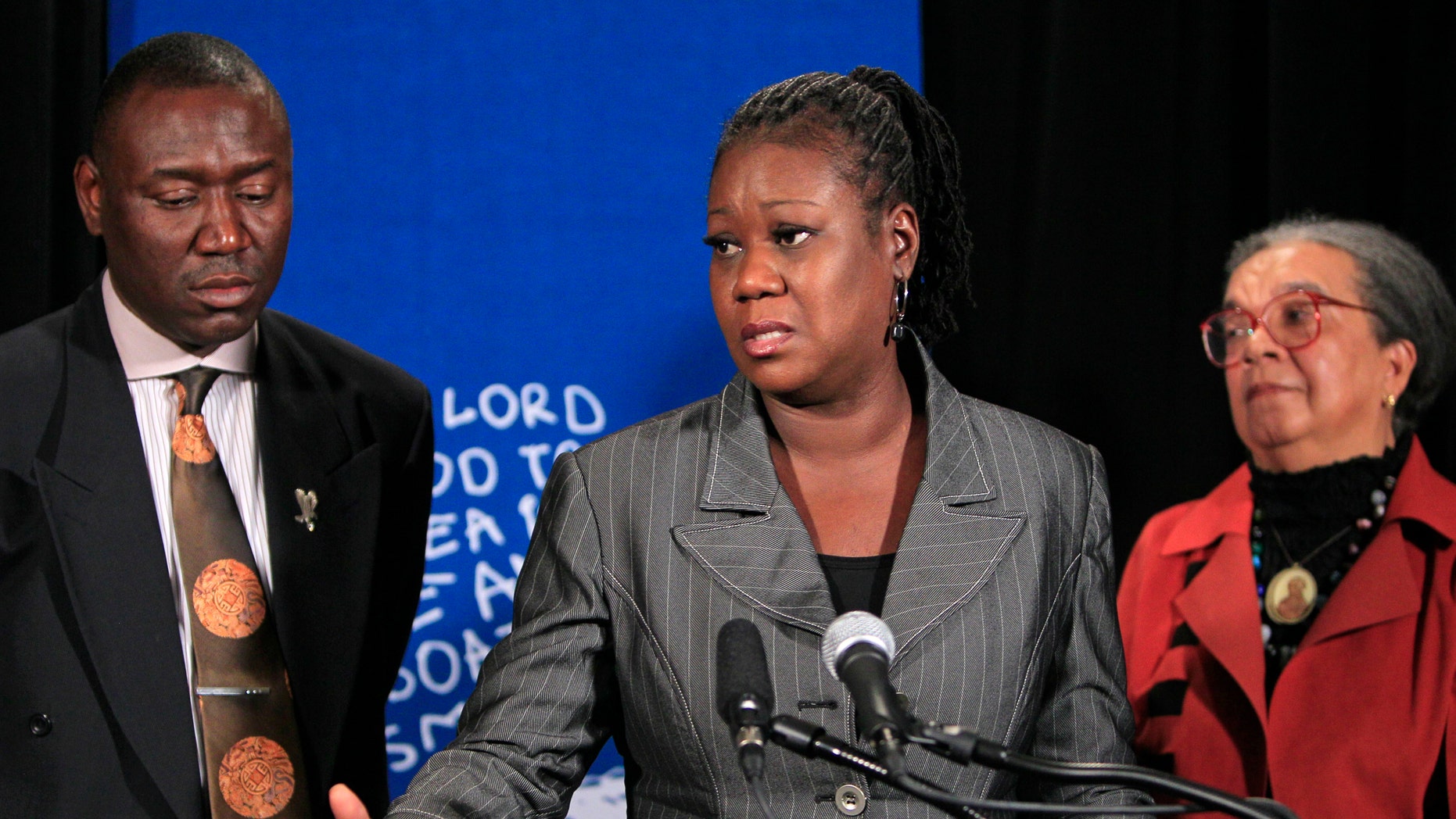 July 25, 2012 - Sybrina Fulton (center) mother of Trayvon Martin, speaking at a news conference.