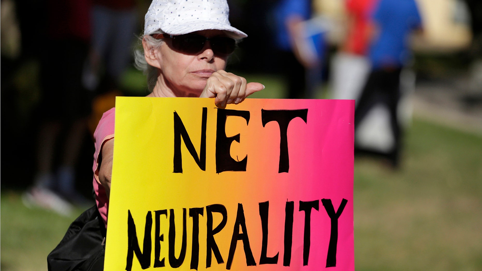 File photo. Lori Erlendsson attends a pro-net neutrality Internet activist July 23, 2014.