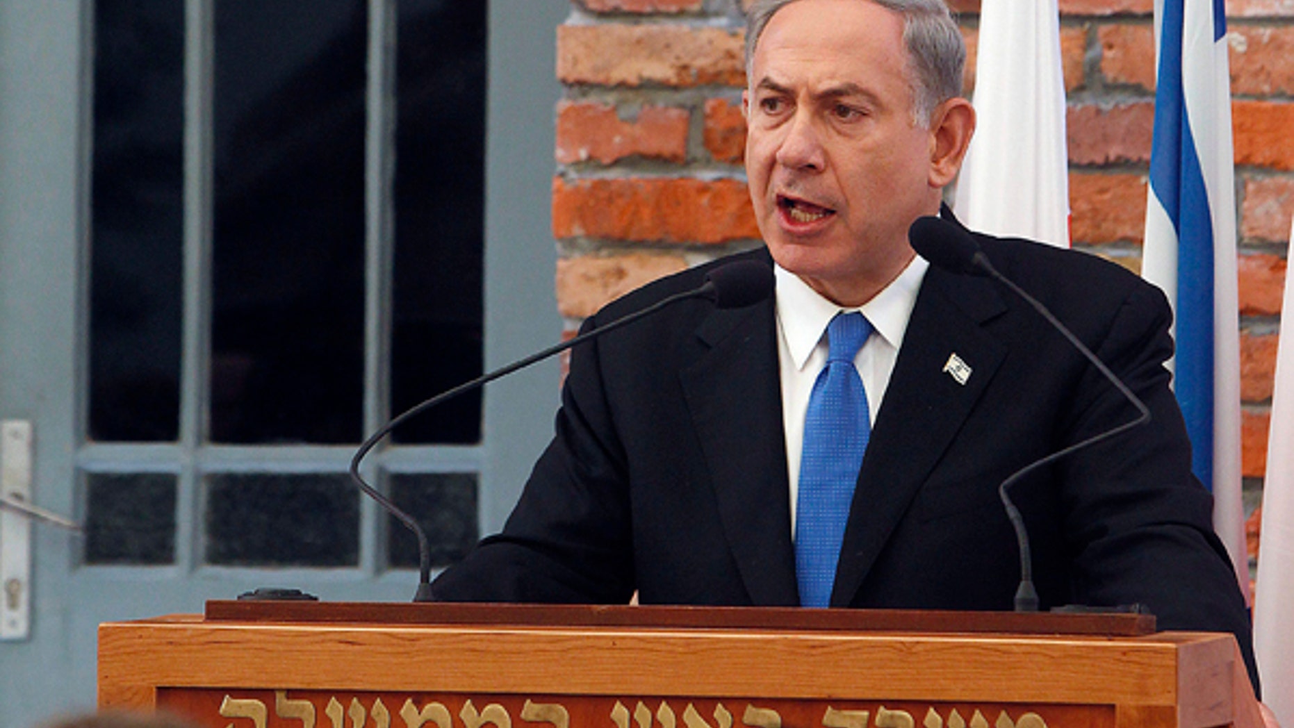 June 13, 2013: Israeli Prime Minister Benjamin Netanyahu delivers a speech following the opening of a new pavilion at the former Nazi death camp of Auschwitz, in Oswiecim, Poland. The exhibition in Bloc 27 is meant to educate visitors about the Holocaust and the Nazi Germanys quest to exterminate the Jewish people.