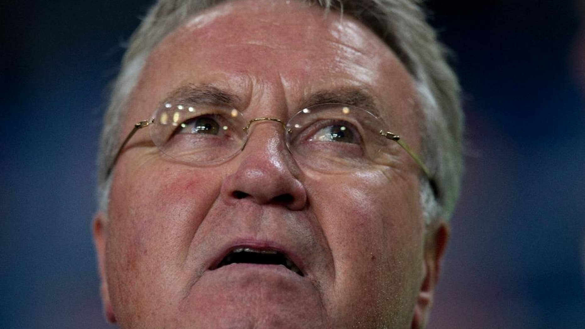 Netherlands head coach Guus Hiddink watches his players prior to the Euro 2016 qualifying match between The Netherlands and Kazakhstan at ArenA stadium in Amsterdam, Netherlands, Friday, Oct. 10, 2014. (AP Photo/Peter Dejong)