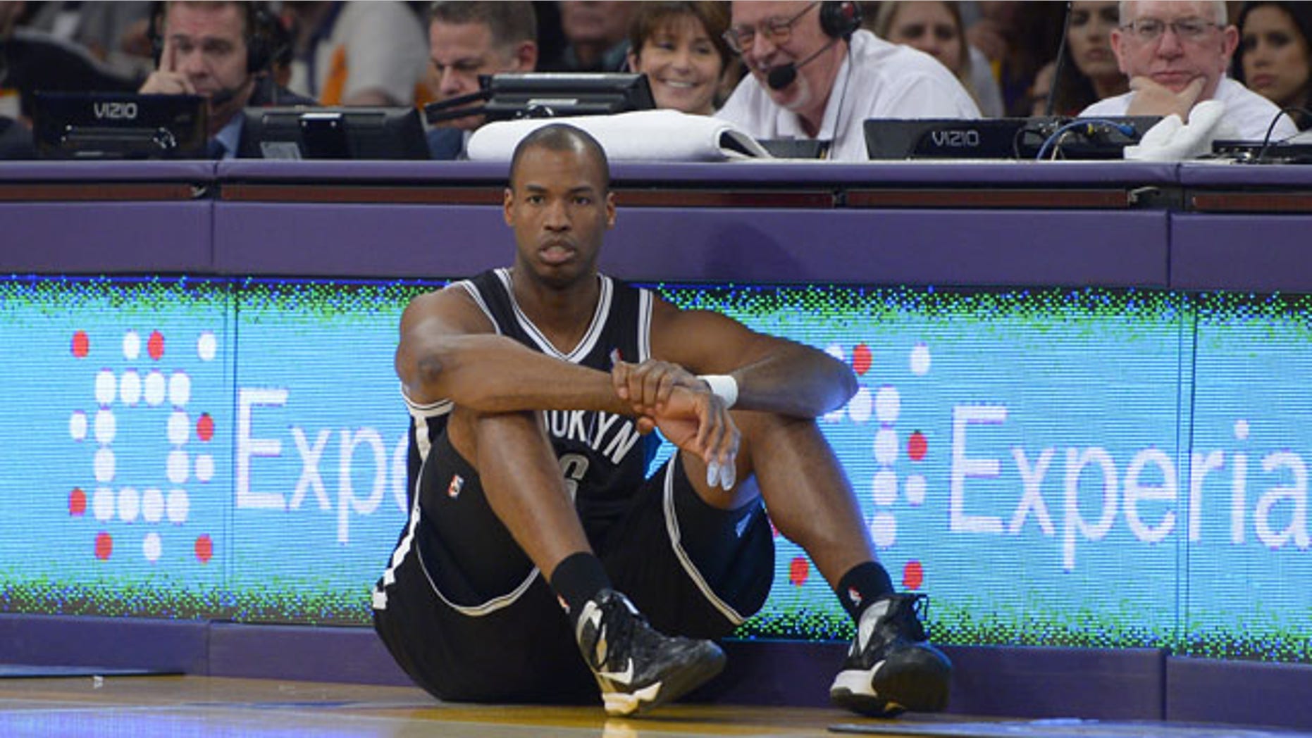 February 23, 2014: Brooklyn Nets center Jason Collins waits to come into the game during the second half of an NBA basketball game against the Los Angeles Lakers. The Nets won 108-102. (AP Photo/Mark J. Terrill)
