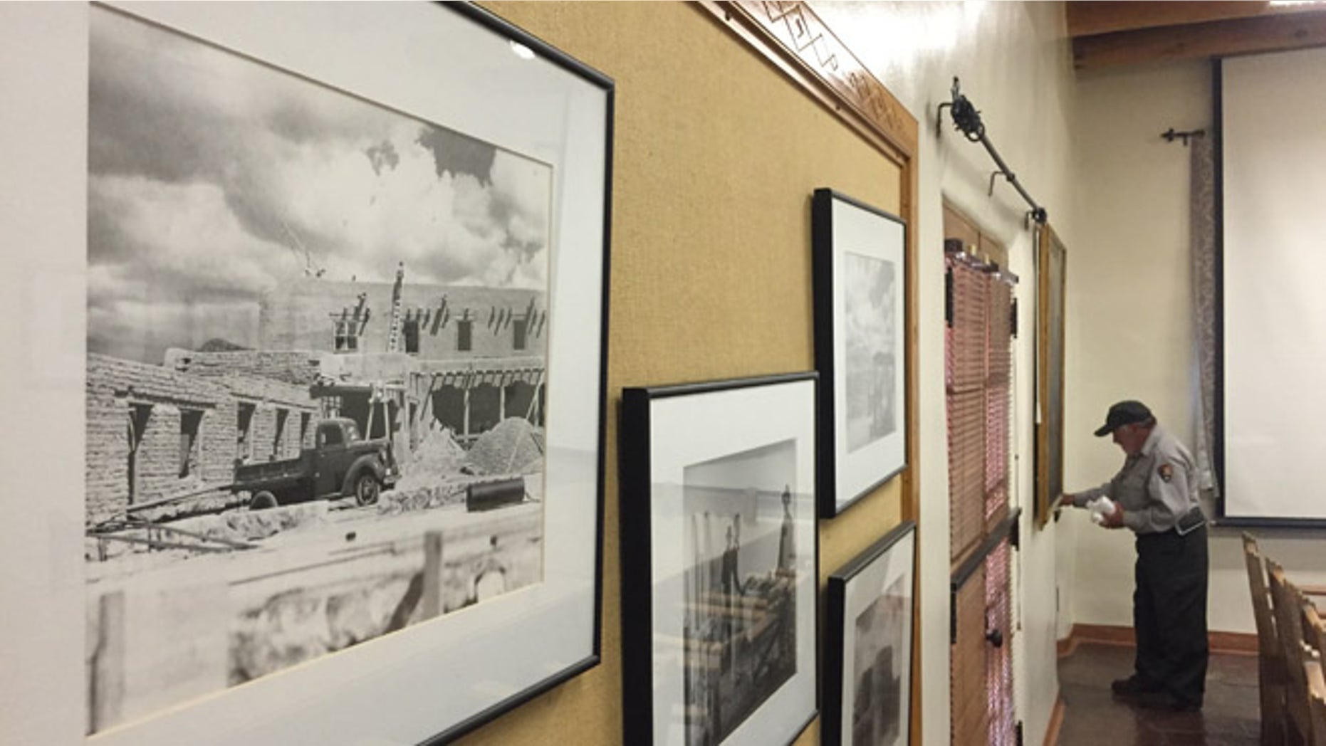 A custodian works at the National Park Service administration building, nicknamed the 'Old Santa Fe Trail Building.'