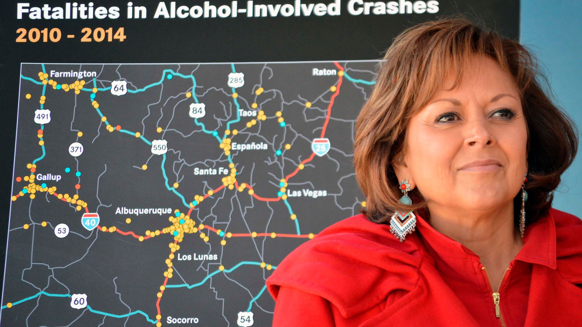 New Mexico Gov. Susana Martinez stands in front of a state map of drunken-driving deaths during a news conference in Albuquerque, N.M. on Monday, Dec. 7, 2015. A recording from a Santa Fe police sergeant's belt tape suggests Martinez was inebriated the night police responded to a complaint at a downtown hotel where the governor was hosting a holiday party. Santa Fe Police released the recording, Tuesday, Dec. 22, 2015, shedding more light on the Dec. 13 incident at the Eldorado Hotel and Spa. A clerk initially called dispatchers to report noise and that someone was throwing bottles from a hotel balcony. (AP Photo/Russell Contreras, File)