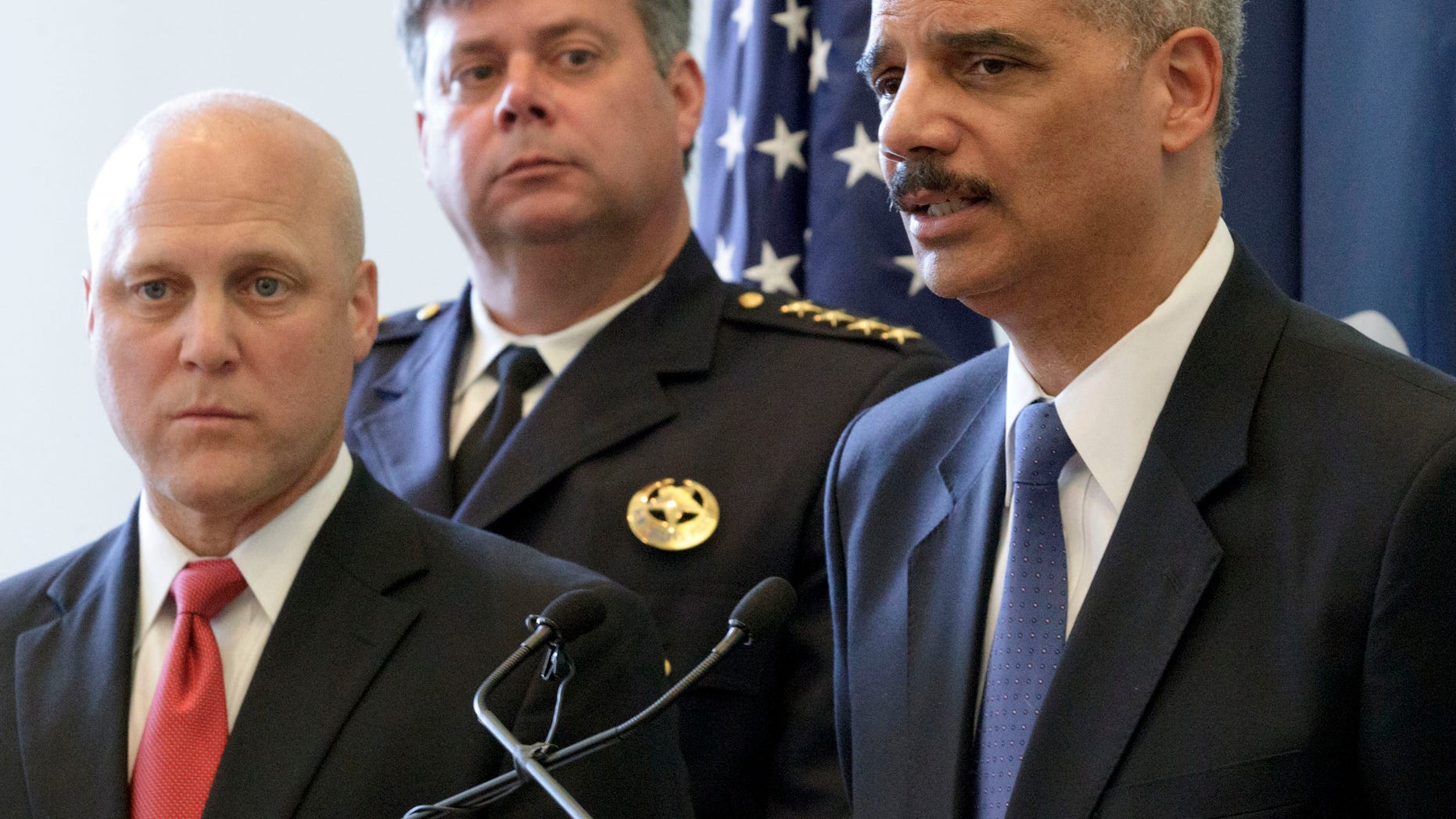 July 24, 2012: U.S. Attorney General Eric Holder speaks next to New Orleans Mayor Mitch Landrieu, far left, and Police Superintendent Ronal Serpas about the details of a federal consent decree from the U.S. Department of Justice that will be used to institute reforms in the New Orleans Police Department inside the historic Gallier Hall.