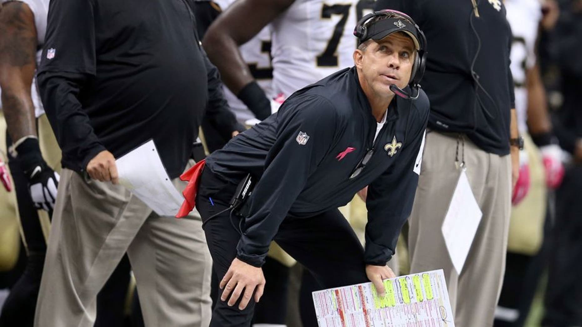 Oct 4, 2015; New Orleans, LA, USA; New Orleans Saints head coach Sean Payton, along with defensive coordinator Rob Ryand and senior defensive assistant Dennis Allen watch from the sidelines in the fourth quarter of their game against the Dallas Cowboys at Mercedes-Benz Superdome. The Saints won, 26-20. Mandatory Credit: Chuck Cook-USA TODAY Sports