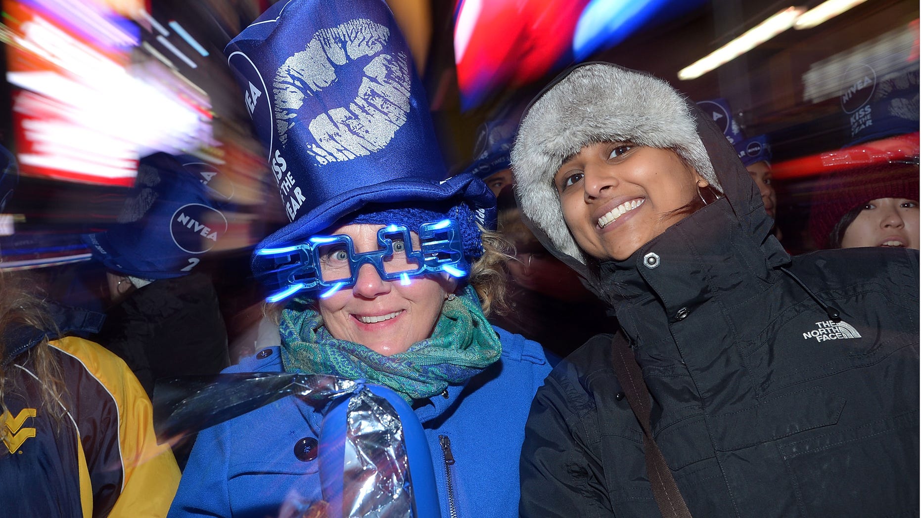 NEW YORK, NY - DECEMBER 31: A view of spectators during New Year's Eve 2013 In Times Square at Times Square on December 31, 2012 in New York City. (Photo by Mike Coppola/Getty Images)