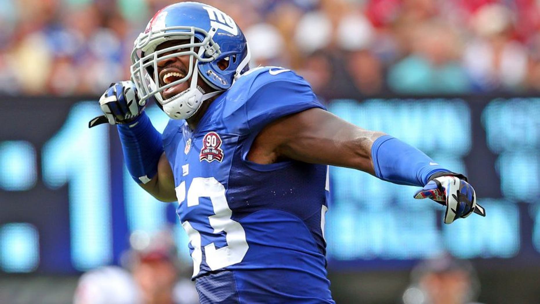 Sep 21, 2014; East Rutherford, NJ, USA; New York Giants outside linebacker Jameel McClain (53) reacts against the Houston Texans during the third quarter at MetLife Stadium. Mandatory Credit: Brad Penner-USA TODAY Sports