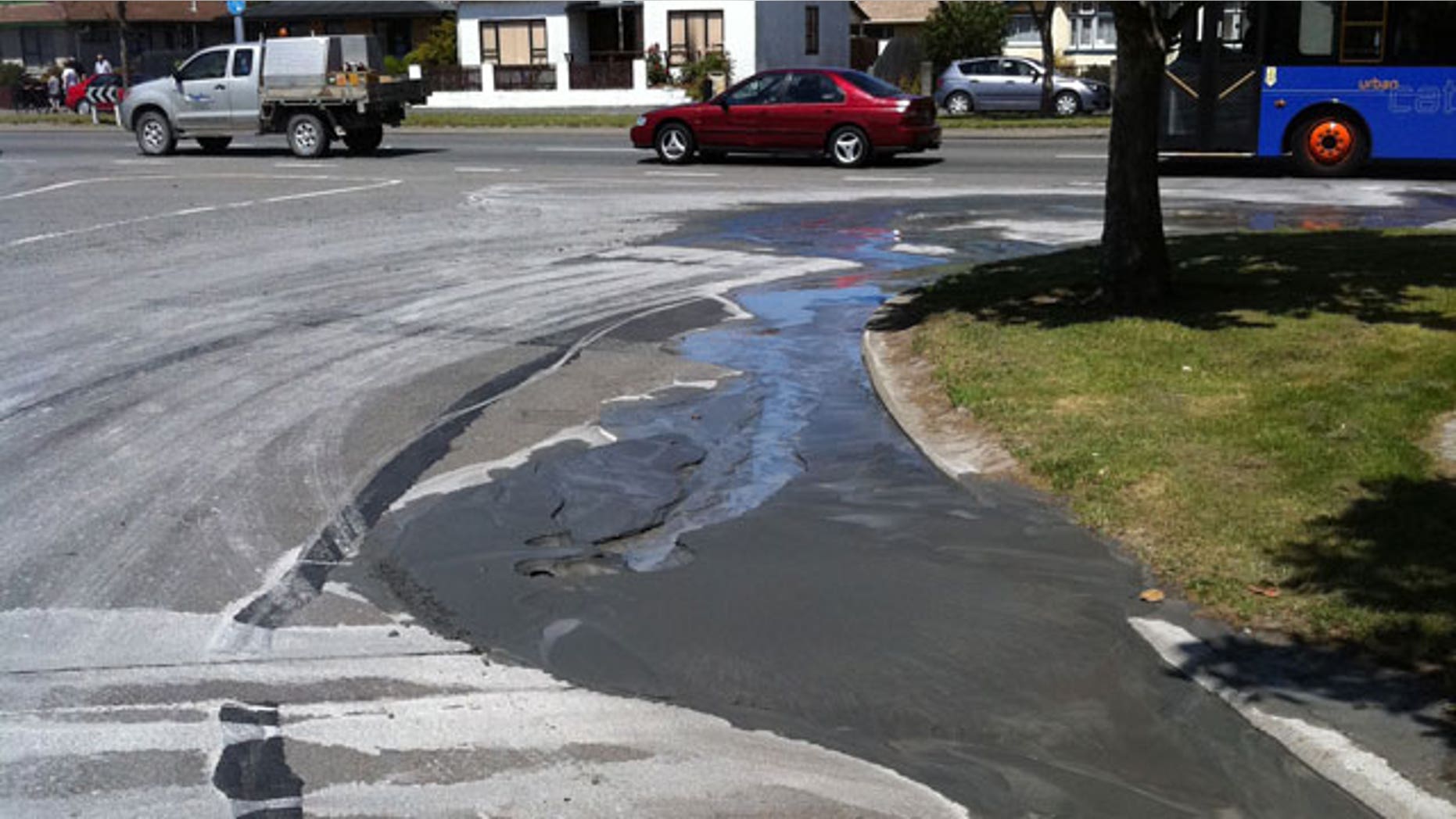 December 23, 2011: Liquefaction is seen seeping out of the ground after a 5.8-magnitude quake struck 16 miles north of Christchurch, New Zealand.