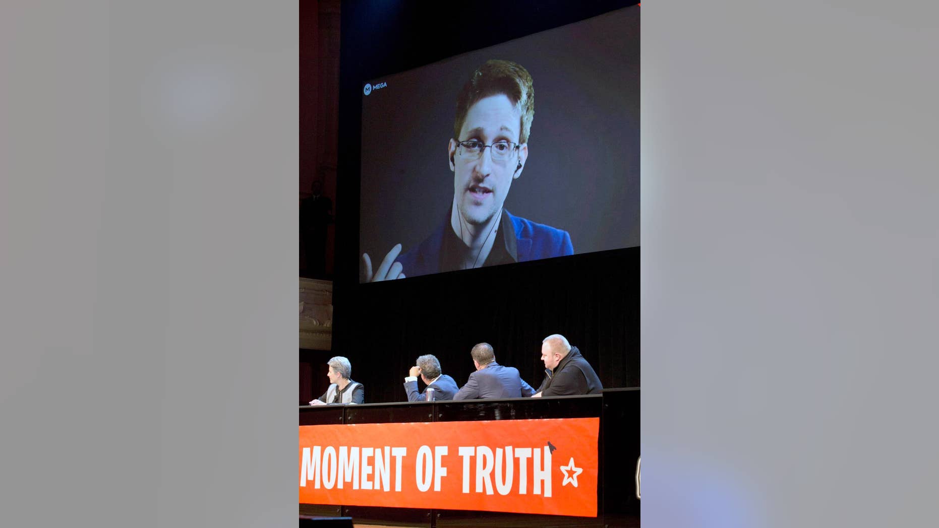 Sept. 15, 2014 - Former NSA systems analyst turned leaker Edward Snowden appears via video link from Russia to hundreds at the Auckland, New Zealand Town Hall. Snowden says the NSA is collecting mass surveillance data on New Zealanders through its XKeyscore program and has set up a facility to tap into vast amounts of data.