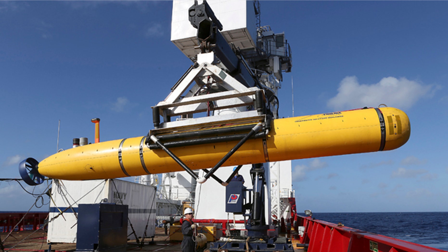 April 17, 2014: In this photo provided by the Australian Defense Force, the Phoenix International Autonomous Underwater Vehicle (AUV) Artemis is craned over the side of Australian Defense Vessel Ocean Shield before launching the vehicle into the southern Indian Ocean in the search of the missing Malaysia Airlines Flight 370. (AP Photo/Australian Defense Force, Bradley Darvill)
