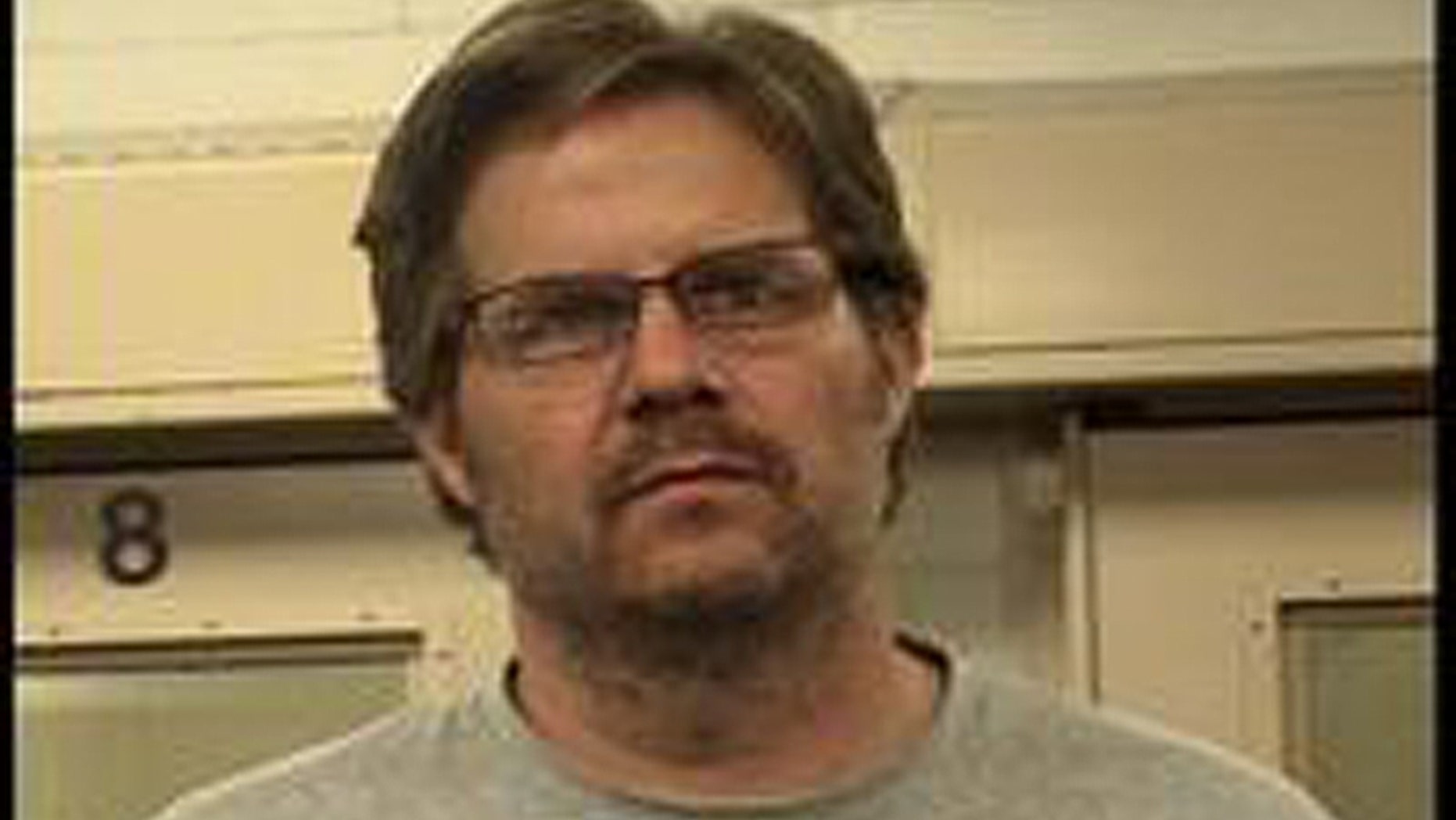 University of New Mexico Professor David Correia's job is still safe, even though he led 20 protesters who stormed the office of Albuquerque Mayor Richard Berry.