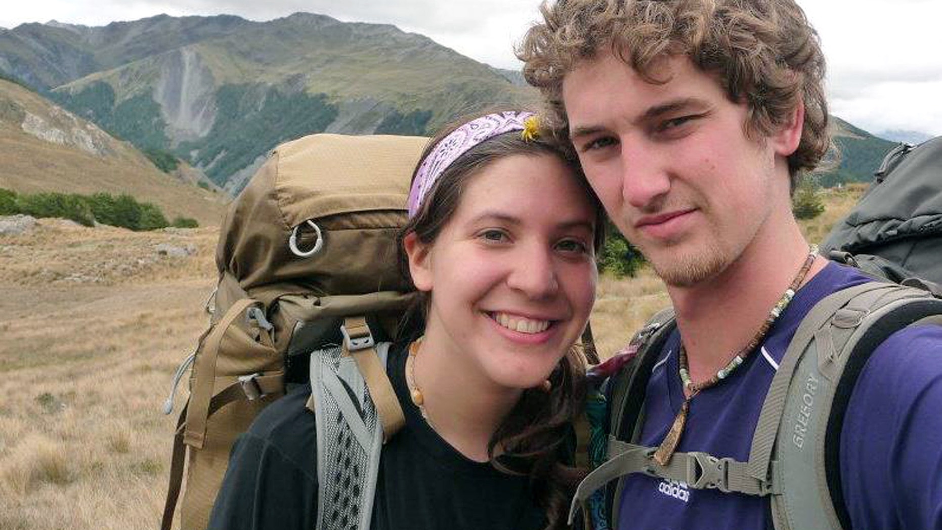 FILE: Alec Brown and his girlfriend Erica Klintworth pose near mountains at an unknown location.