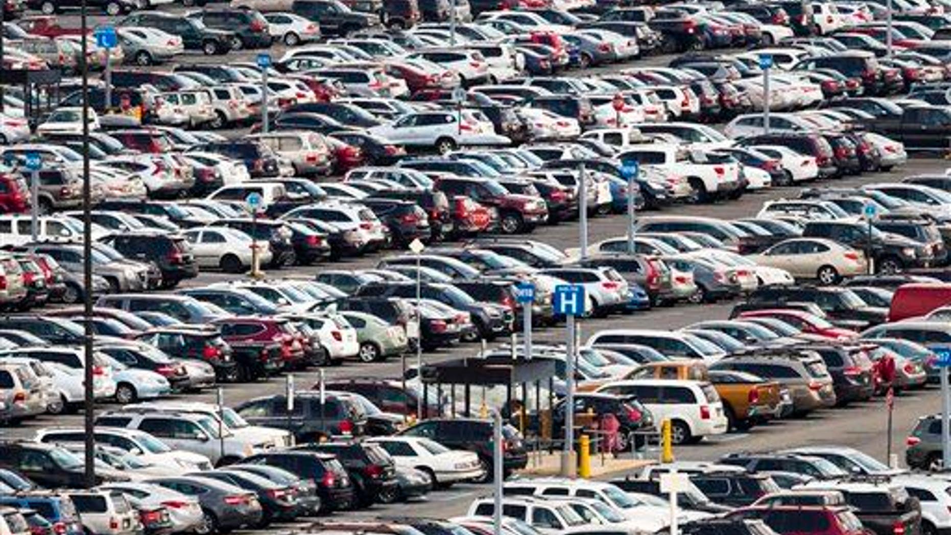 Cars are parked at the Philadelphia International Airport, Thursday, July 17, 2014, in Philadelphia.