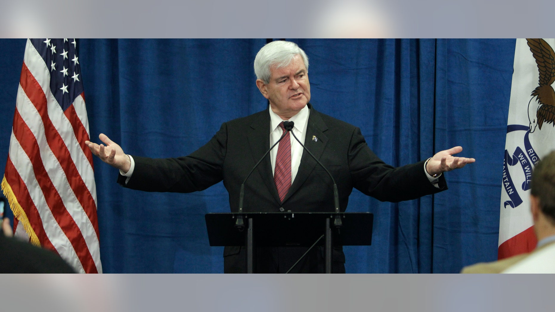 FILE - In this Dec. 1, 2011, file photo, Republican presidential candidate, former House Speaker Newt Gingrich speaks during a meeting with employees at Nationwide Insurance in Des Moines, Iowa. If theres any one reason that might explain Gingrichs sharp rise in the polls in Iowa, its this: Republicans in the state are aching for an attack dog to go after President Barack Obama. (AP Photo/Charlie Neibergall, File)