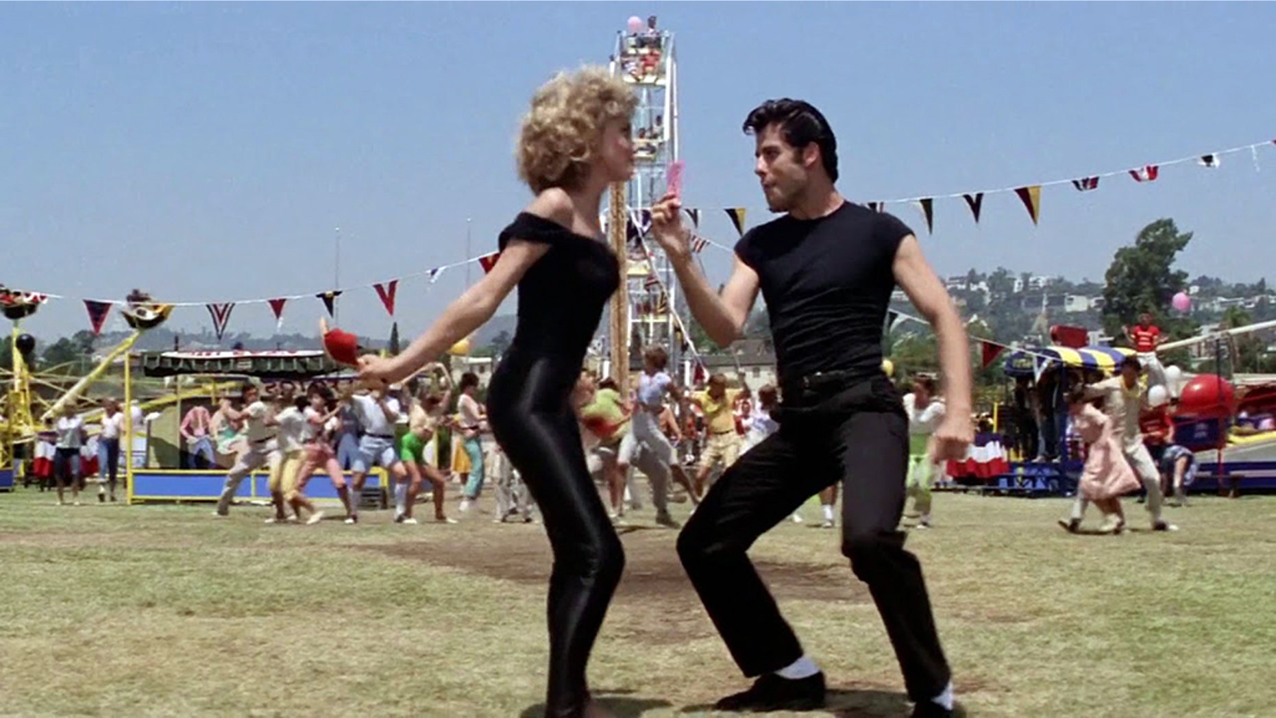 "Grease" actress Didi Conn claimed co-star John Travolta (right) was attracted to actress Olivia Newton-John in real life.
