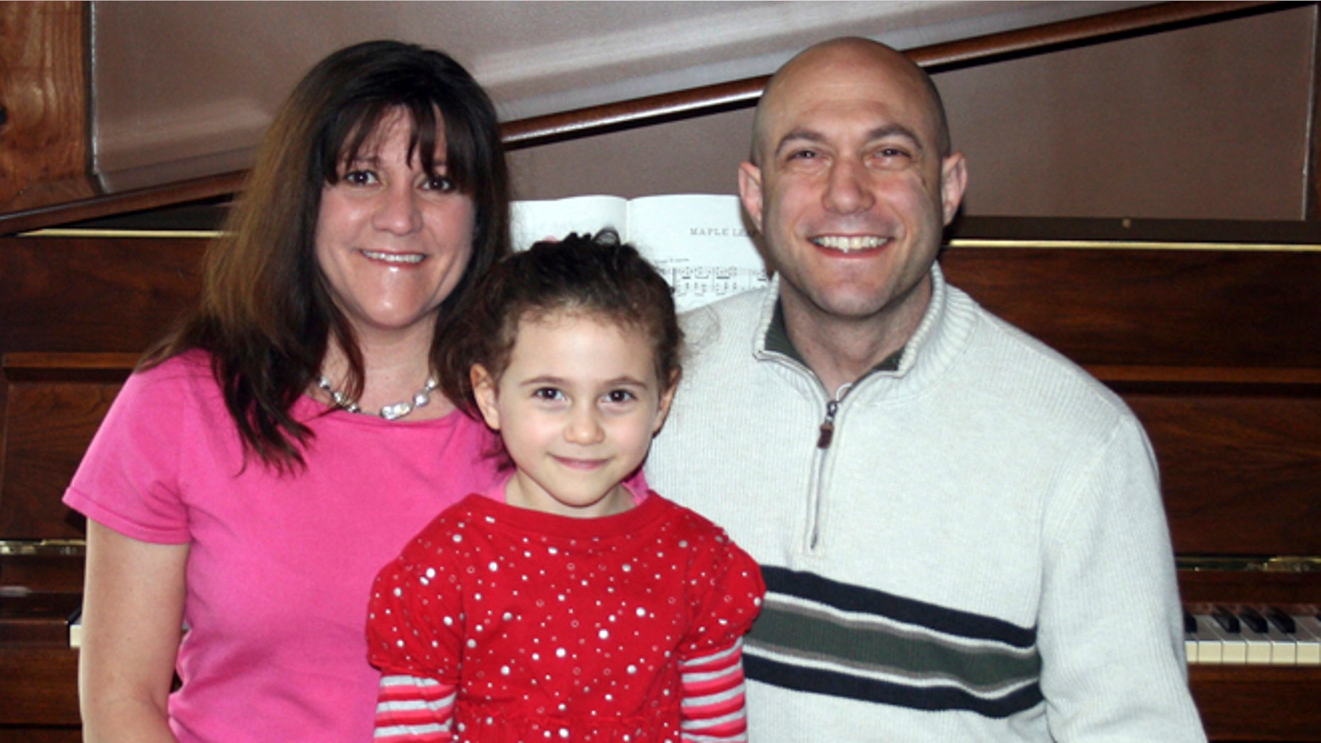 This undated photo provided by the Avielle Foundation shows Jeremy Richman, Jennifer Hensel and their daughter Avielle, 6, who was killed in the shooting massacre by Adam Lanza at Sandy Hook Elementary School in Newtown, Conn., on Dec. 14, 2012. (AP Photo/The Avielle Foundation)