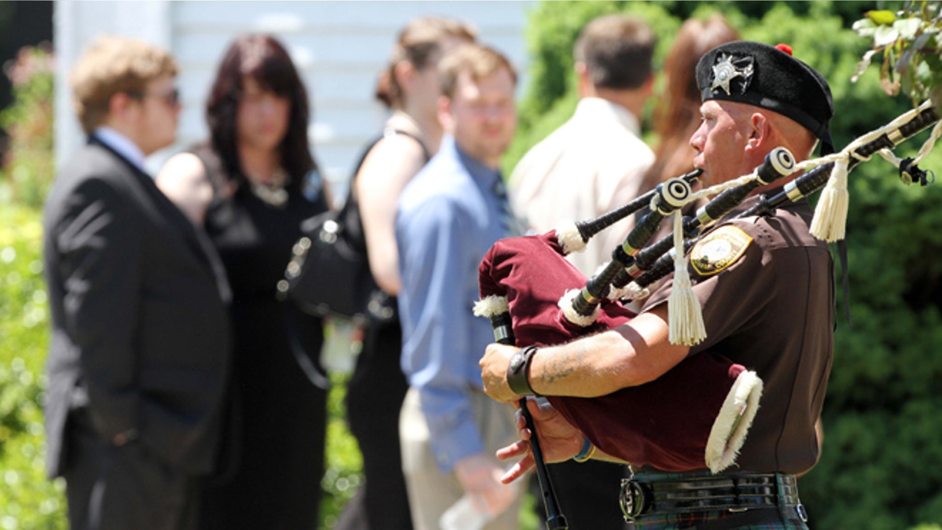 June 1, 2013: Family and friends arrive for a memorial service for Nancy Lanza in Kingston, N.H. Lanzas 20-year-old son, Adam Lanza, killed her at their home in Newtown, Conn., on Dec. 14 and then drove to Sandy Hook Elementary School, where he killed the children and six school employees before committing suicide.