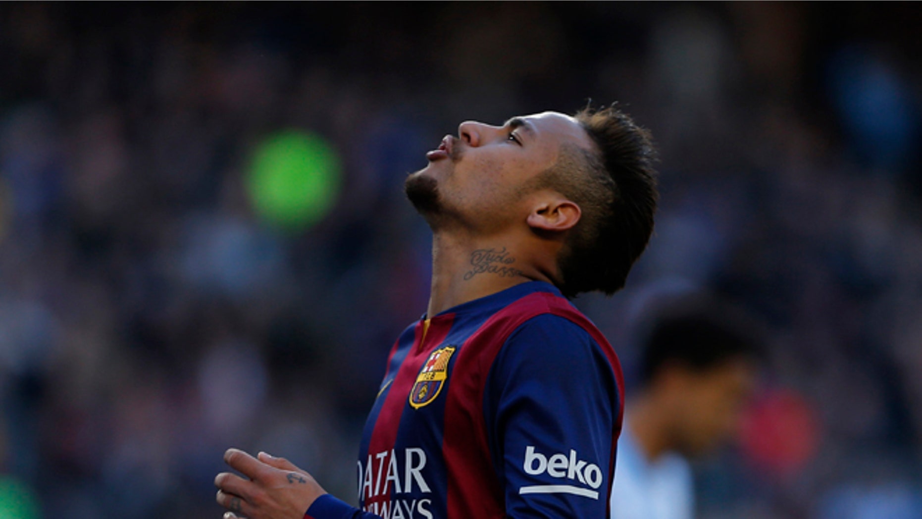 Barcelona's Neymar, from Brazil, reacts during a Spanish La Liga soccer match at the Camp Nou stadium in Barcelona, Spain, Saturday, Feb. 21, 2015. (AP Photo/Emilio Morenatti)