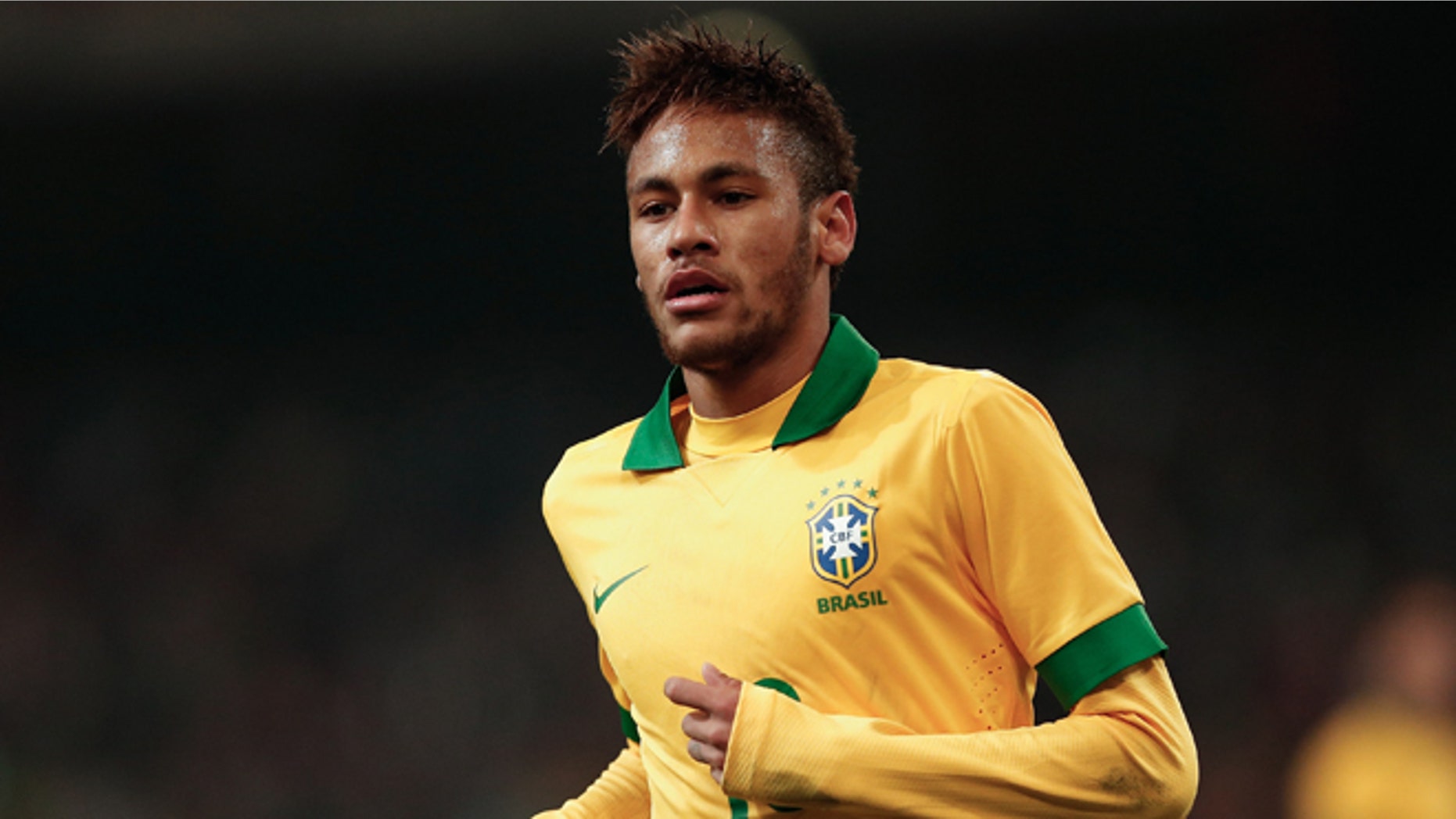 BEIJING, CHINA - OCTOBER 15: Neymar of Brazil in action during the international friendly match between Brazil and Zambia at Beijing National Stadium on October 15, 2013 in Beijing, China. (Photo by Lintao Zhang/Getty Images)