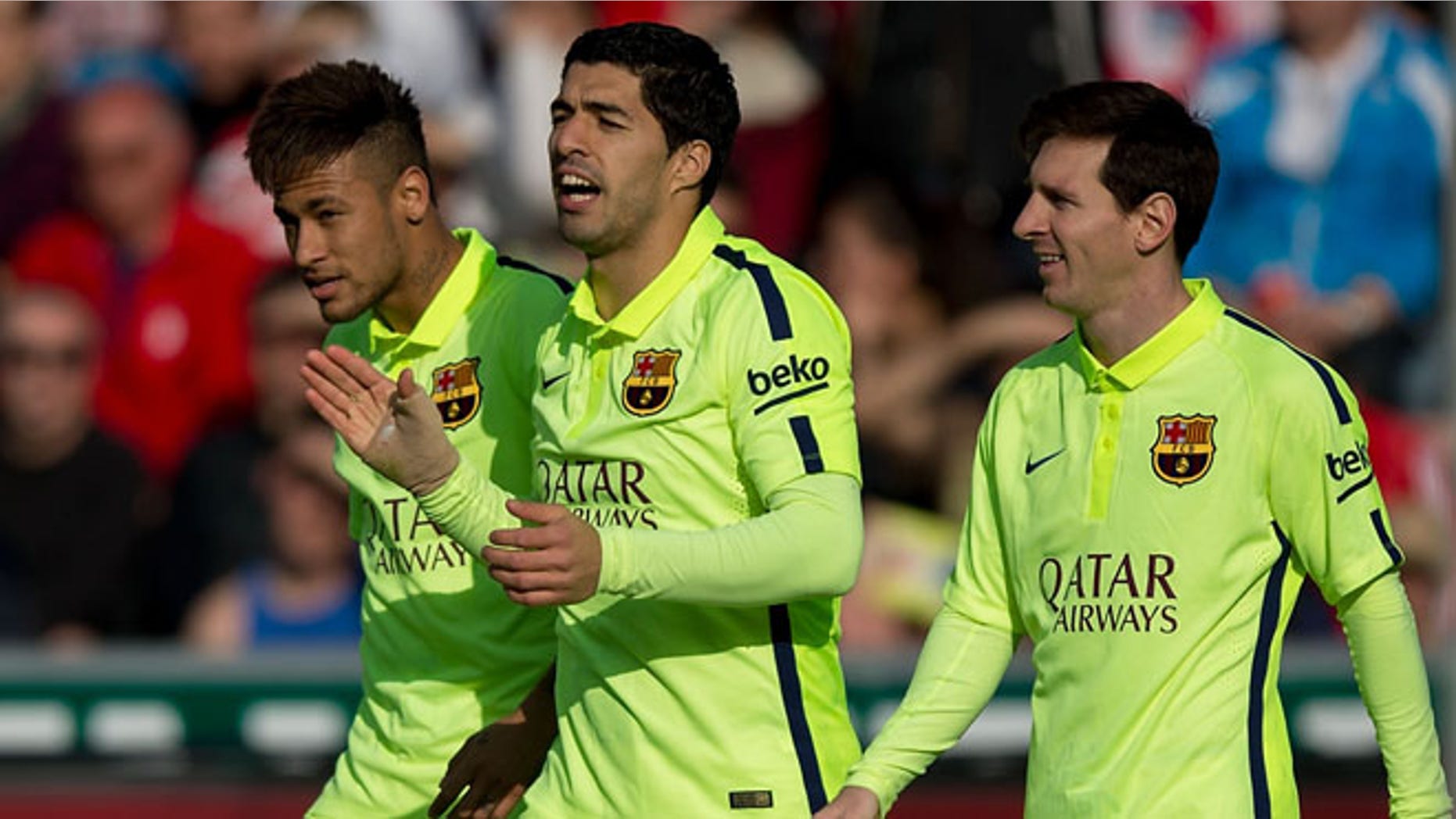 GRANADA, SPAIN - FEBRUARY 28: Luis Suarez (C) celebrates scoring their second goal with team mates Neymar JR. (L) and Lionel Messi (R) during the La Liga match between Granada CF and FC Barcelona at Nuevo Estadio de los Carmenes on February 28, 2015 in Granada, Spain. (Photo by Gonzalo Arroyo Moreno/Getty Images)