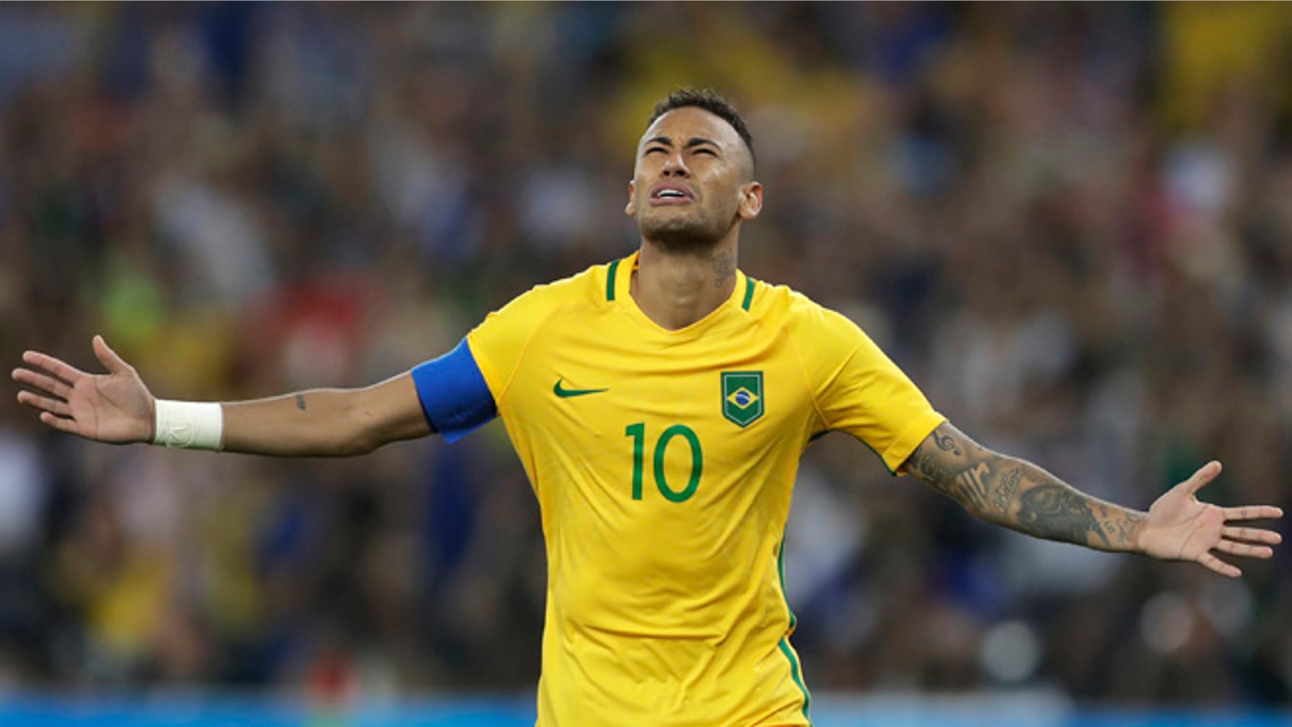 Brazil's Neymar celebrates after scoring the decisive penalty kick during the final match of the men's Olympic football tournament between Brazil and Germany at the Maracana stadium in Rio de Janeiro, Brazil, Saturday Aug. 20, 2016. Brazil won the gold medal on a penalty shootout. (AP Photo/Andre Penner)