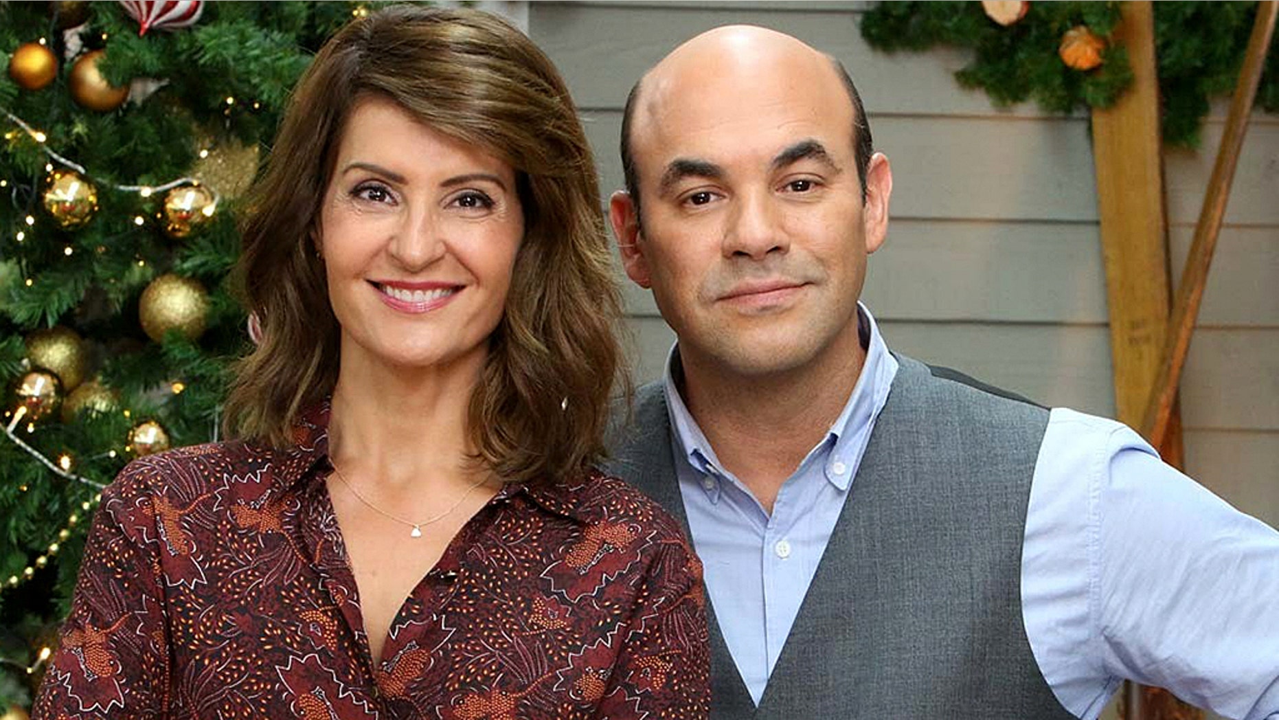 Nia Vardalos and her husband, actor Ian Gomez, have annouced that they are getting a divorce after 25 years of marriage. Here the pair pose on set of "The Great American Baking Show" which the co-hosted together.