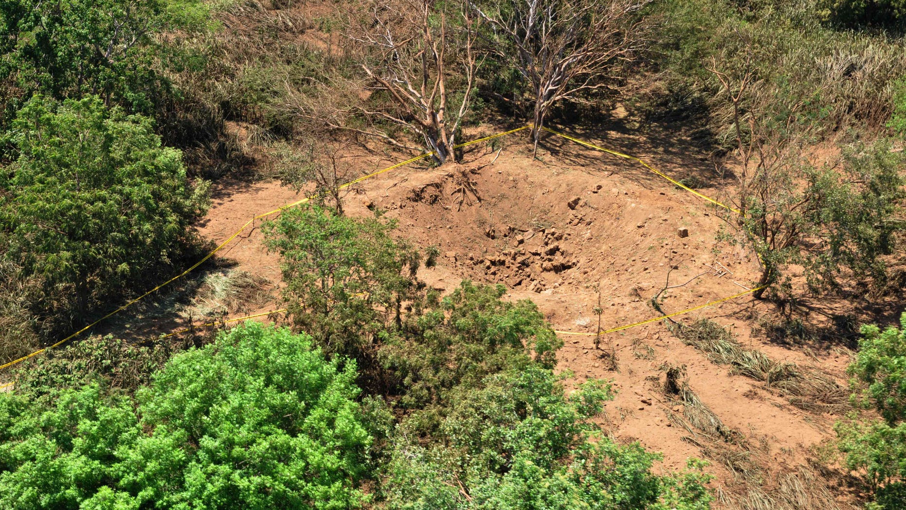 Sept. 7, 2014: An impact crater made by a small meteorite in a wooded area near Managua's international airport and an air force base.