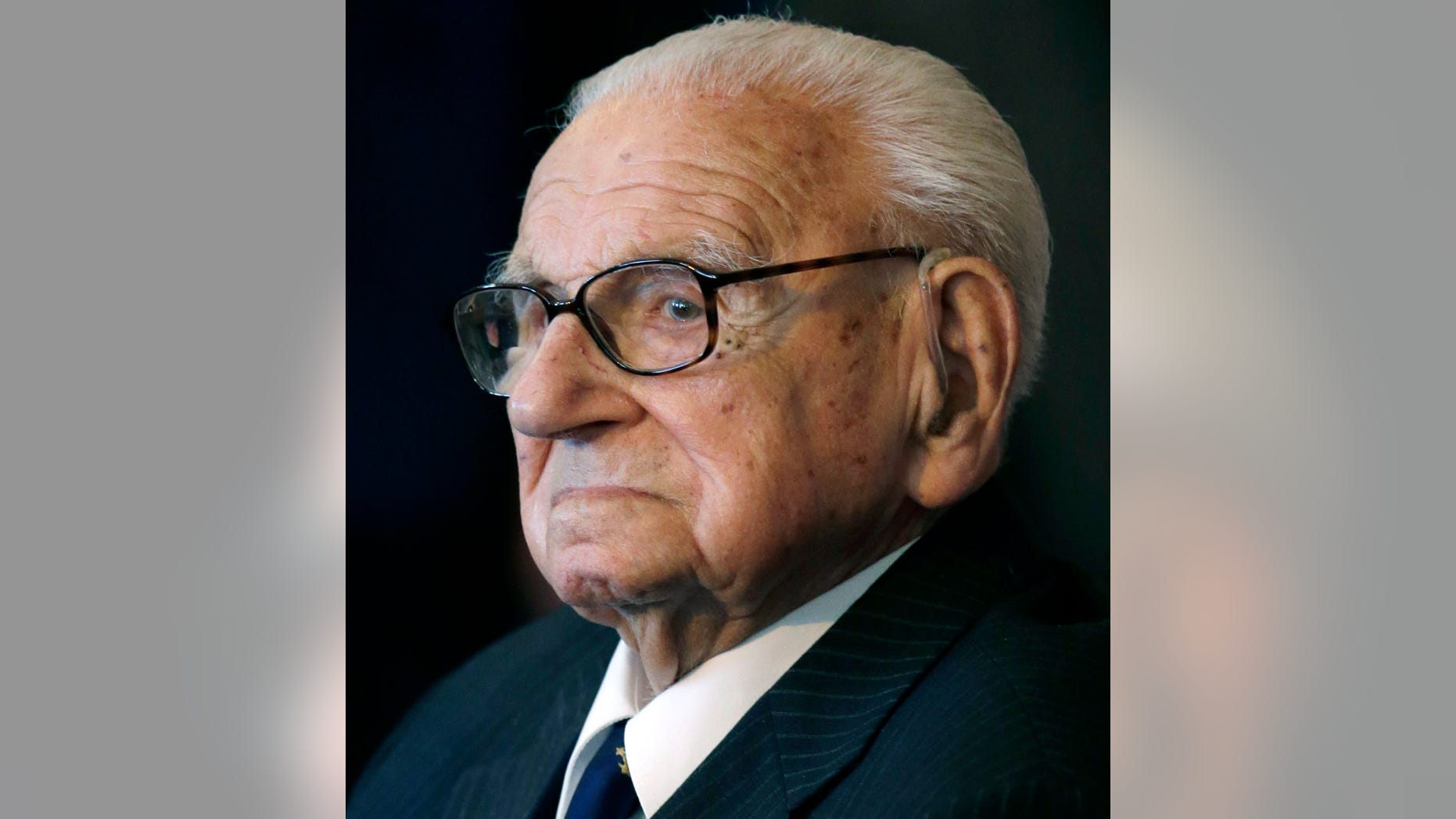Tuesday, Oct. 28, 2014: A photo from files of the then 105 year-old Sir Nicholas Winton waiting to be decorated with the highest Czech Republic's decoration, The Order of the White Lion at the Prague Castle in Prague, Czech Republic.