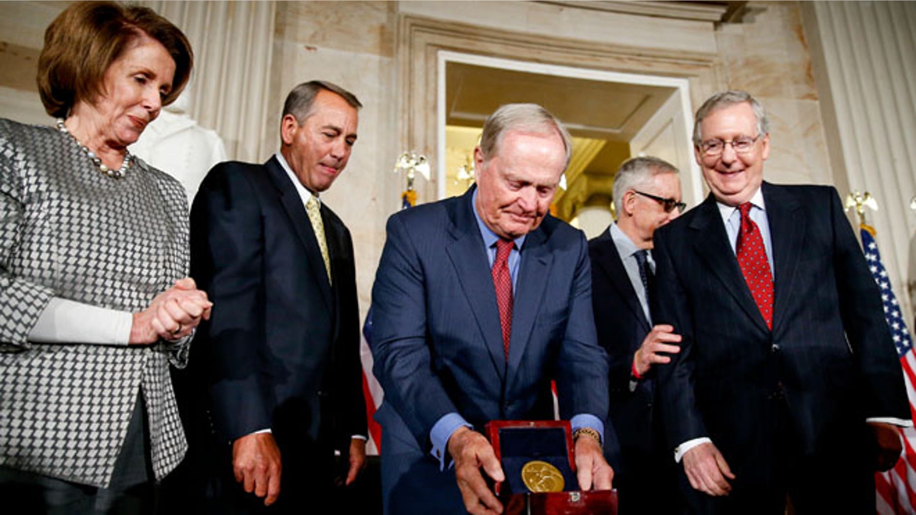 March 24, 2015: Retired golf pro Jack Nicklaus, center, on Capitol Hill, in Washington. D.C., with, from left Reps. Nancy Pelosi and John Boehner and Senators Harry Reid and Mitch McConnell.